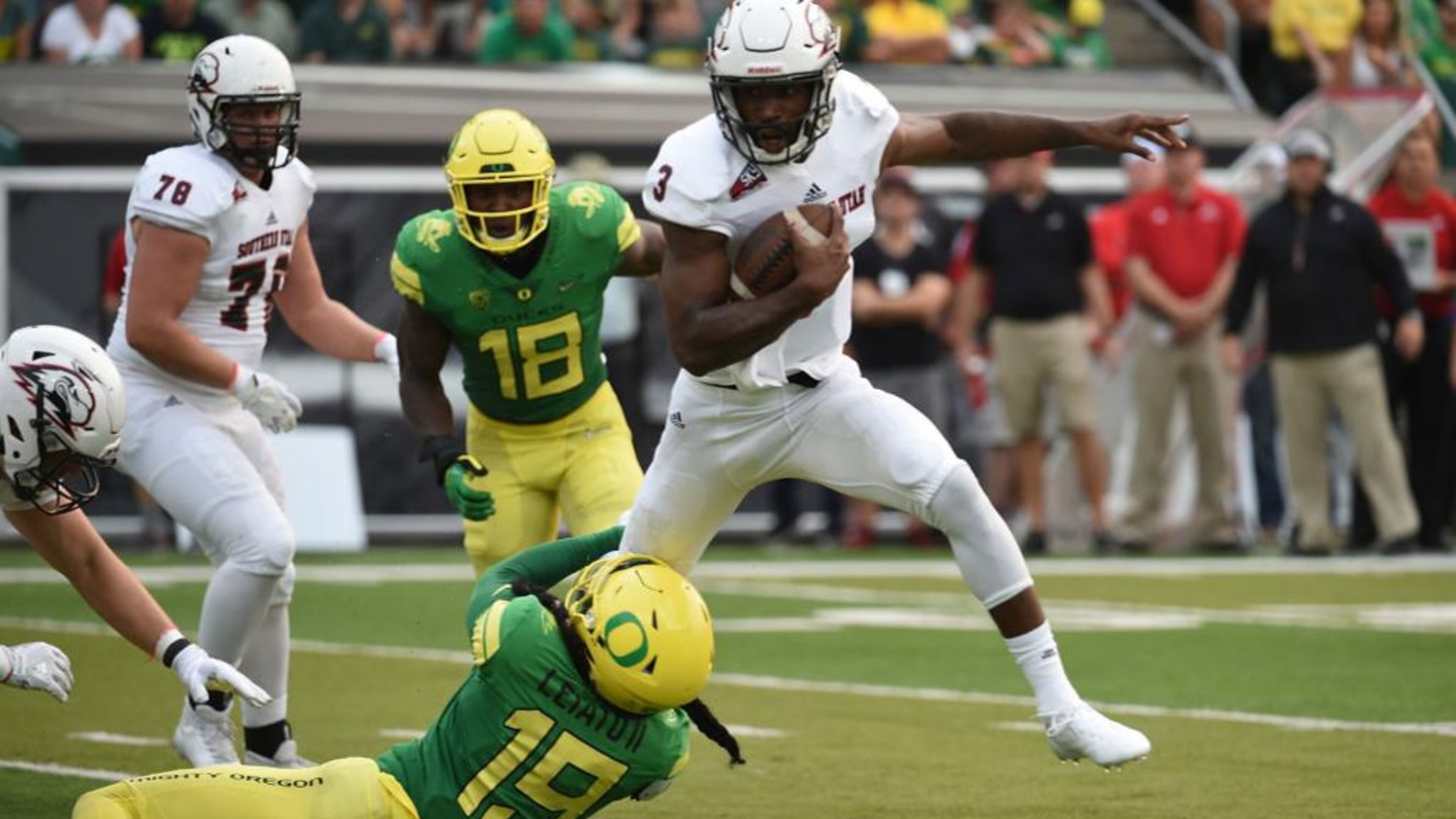 Fotu Leaito (19) attempts to tackle Southern Utah quarterback Patrick Tyler during a game last September.