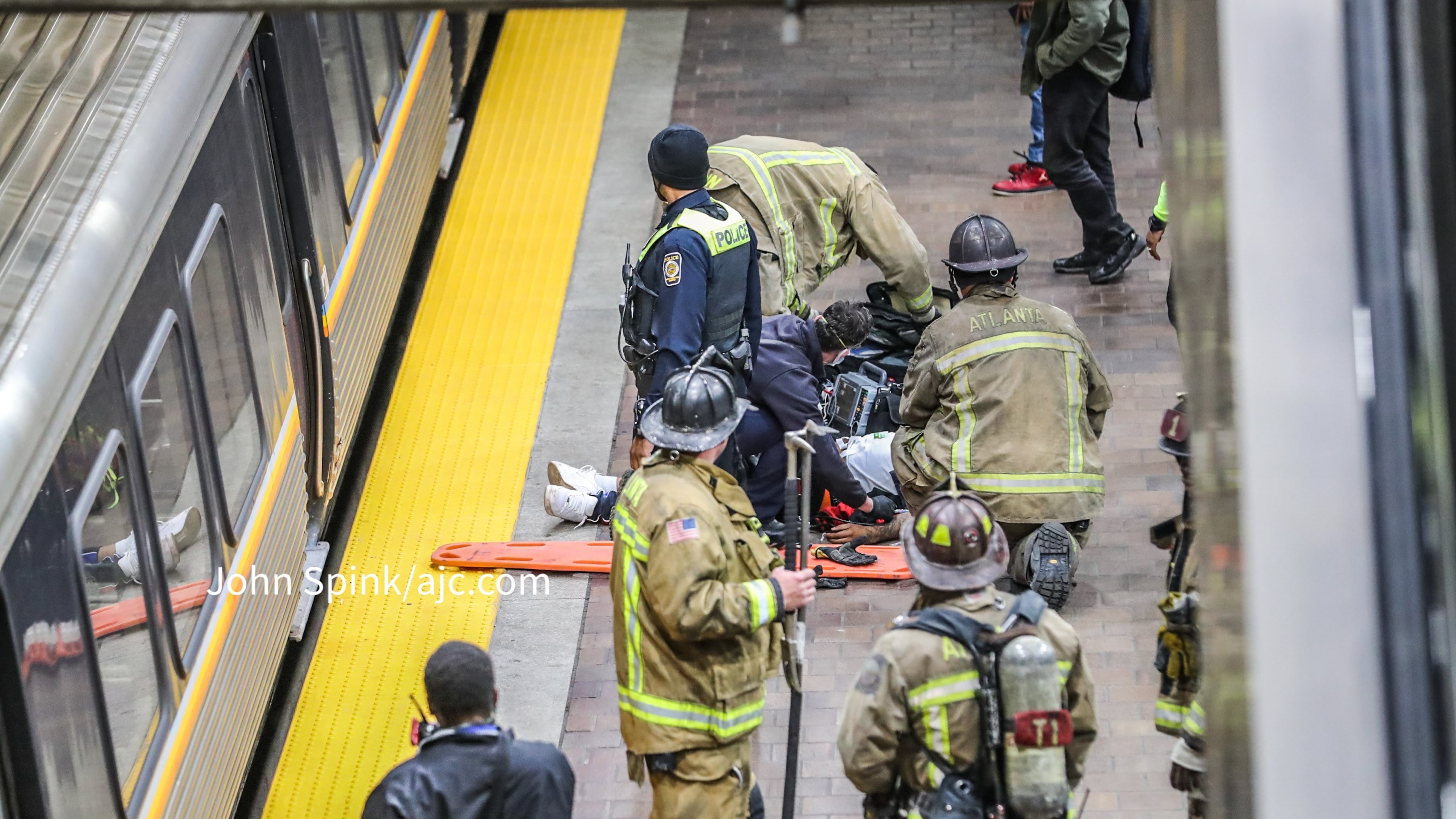 MARTA reported minor delays Thursday morning as crews worked to remove a man from the eastbound track at the Georgia World Congress Center/CNN Center station.