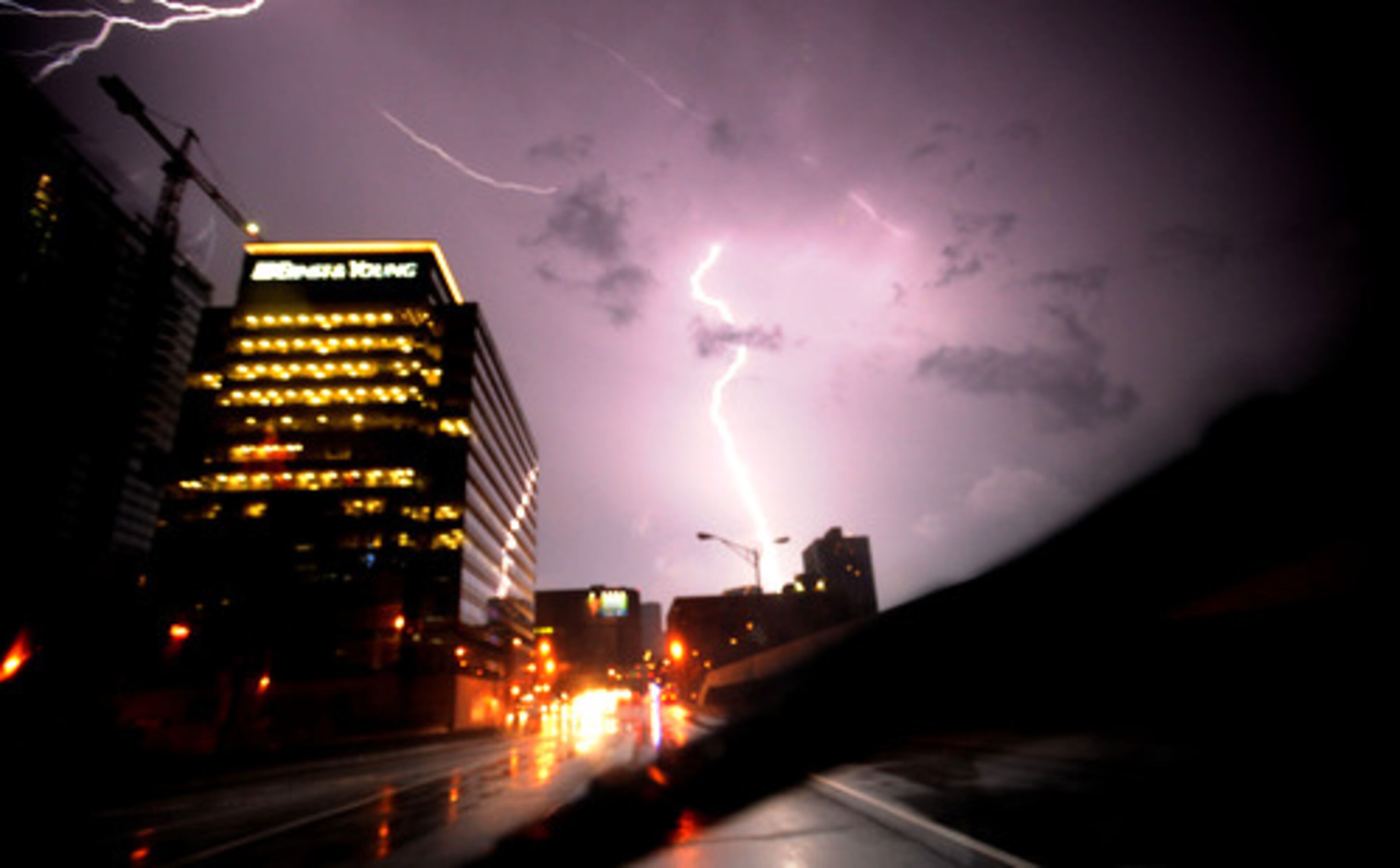 A lightning strike lit up the downtown sky.