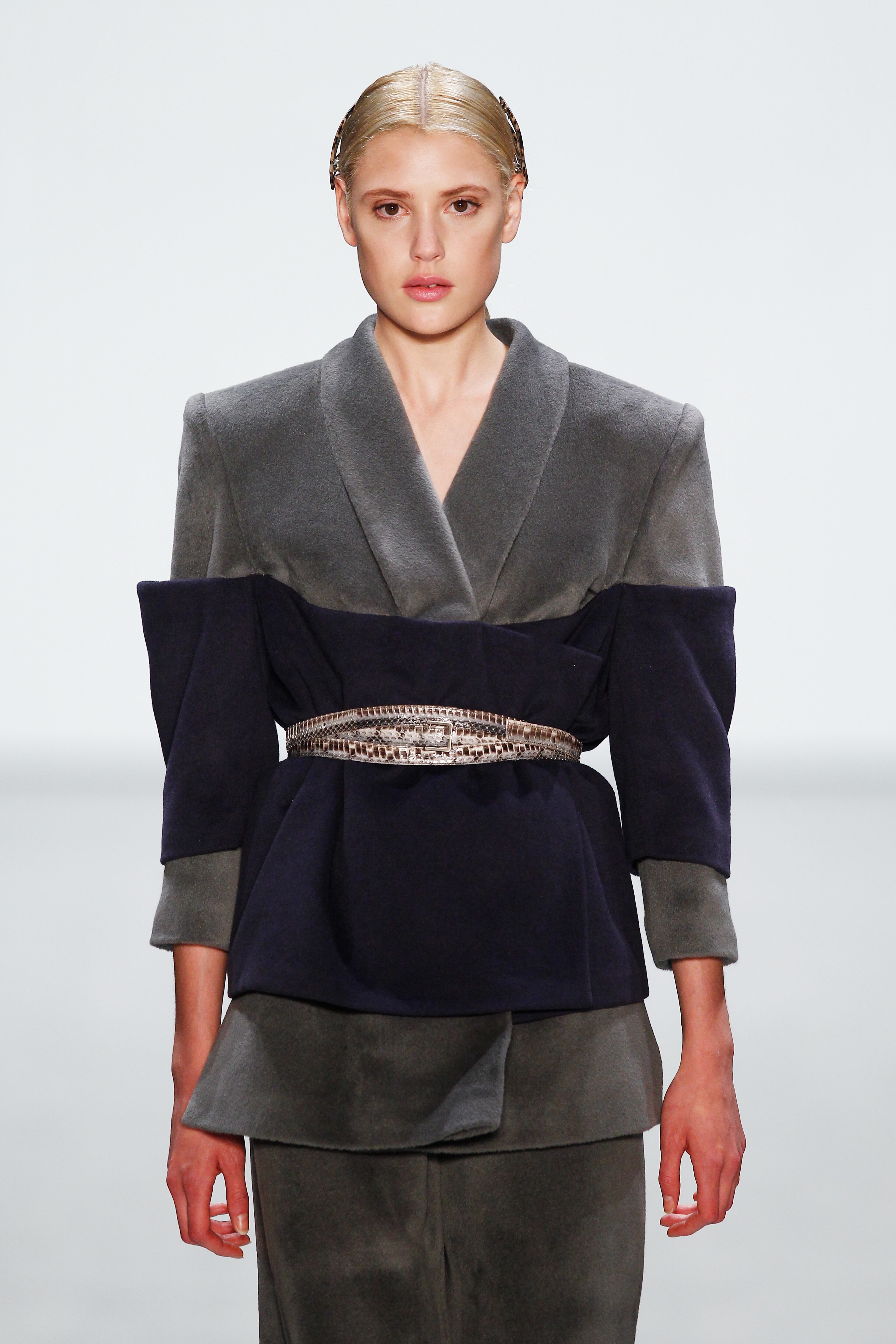 BERLIN, GERMANY - JULY 10: A model walks the runway at the Roshi Porkar presented by Mercedes-Benz and ELLE show during the Mercedes-Benz Fashion Week Spring/Summer 2015 at Erika Hess Eisstadion on July 10, 2014 in Berlin, Germany. (Photo by Peter Michael Dills/Getty Images for IMG)