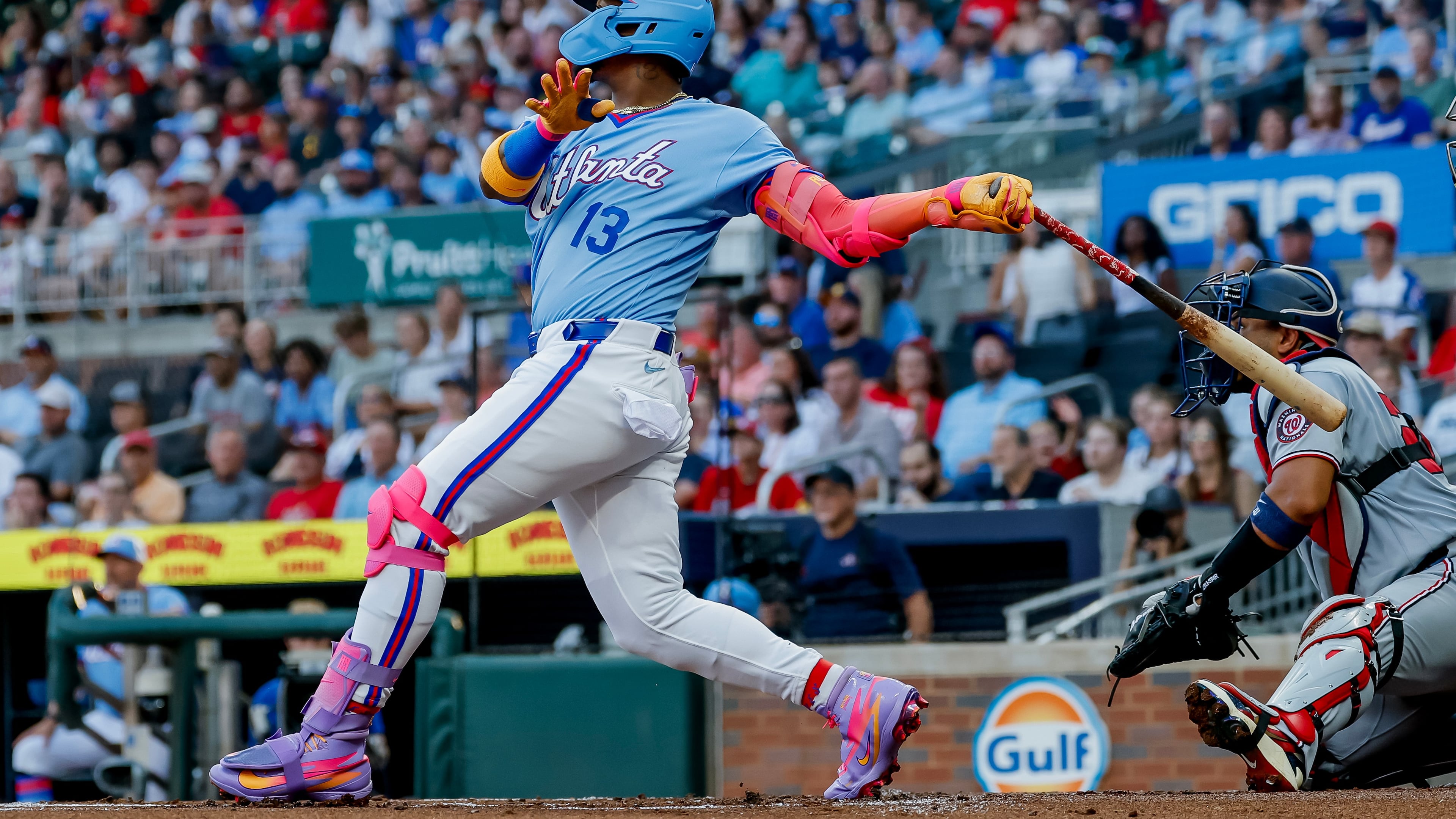 Atlanta Braves' Ronald Acuña Jr. (13) hits a solo home run against the Washington Nationals during the first inning of a baseball game, Saturday, Aug. 1, 2026, in Atlanta. (AP Photo/Erik S. Lesser)