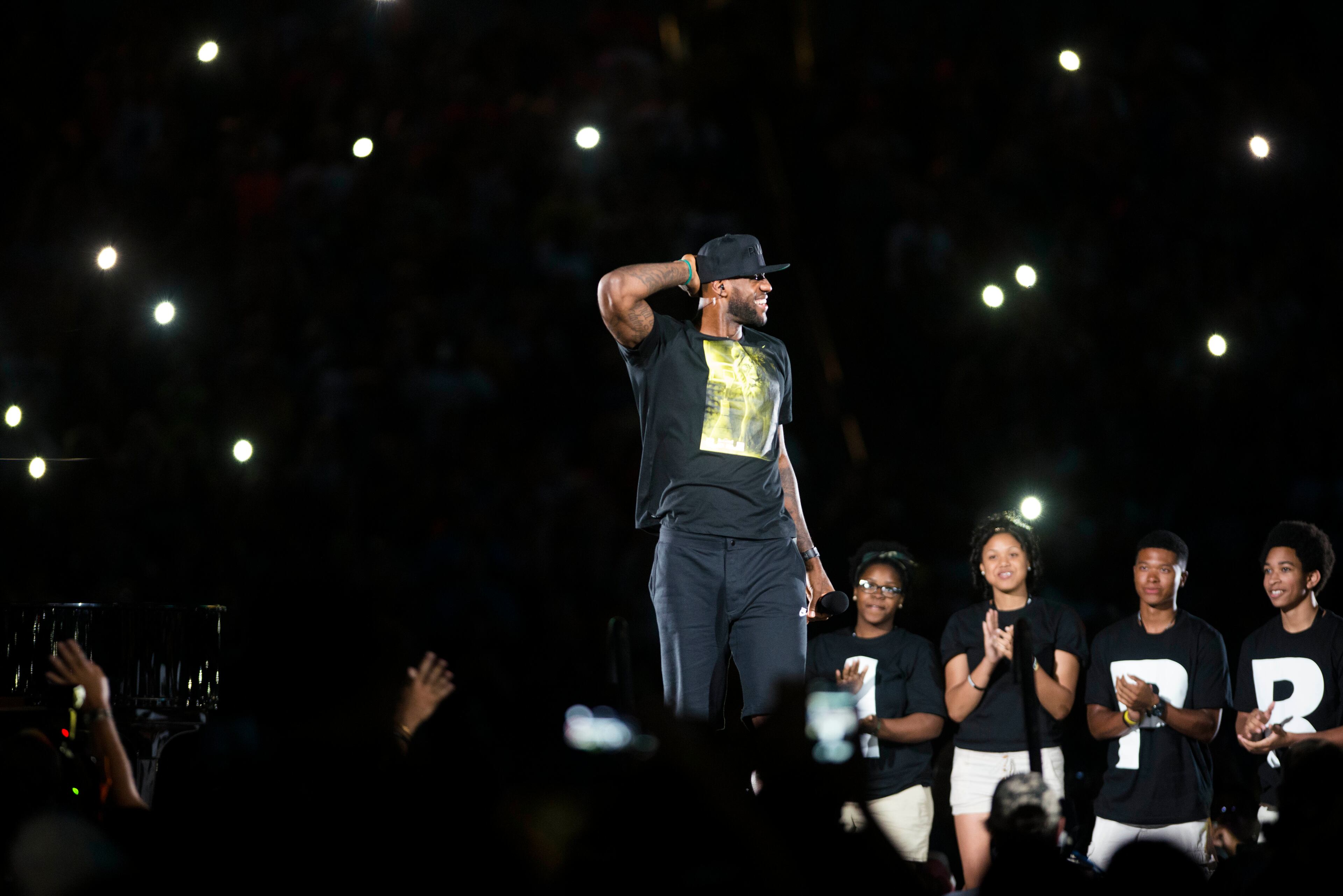 LeBron James speaks to his fans in the city of Akron after taking the stage during his Welcome Home Ceremony at Infocision Stadium at the University of Akron on August 8, 2014 in Akron, Ohio. (Photo by Ty Wright/Getty Images)