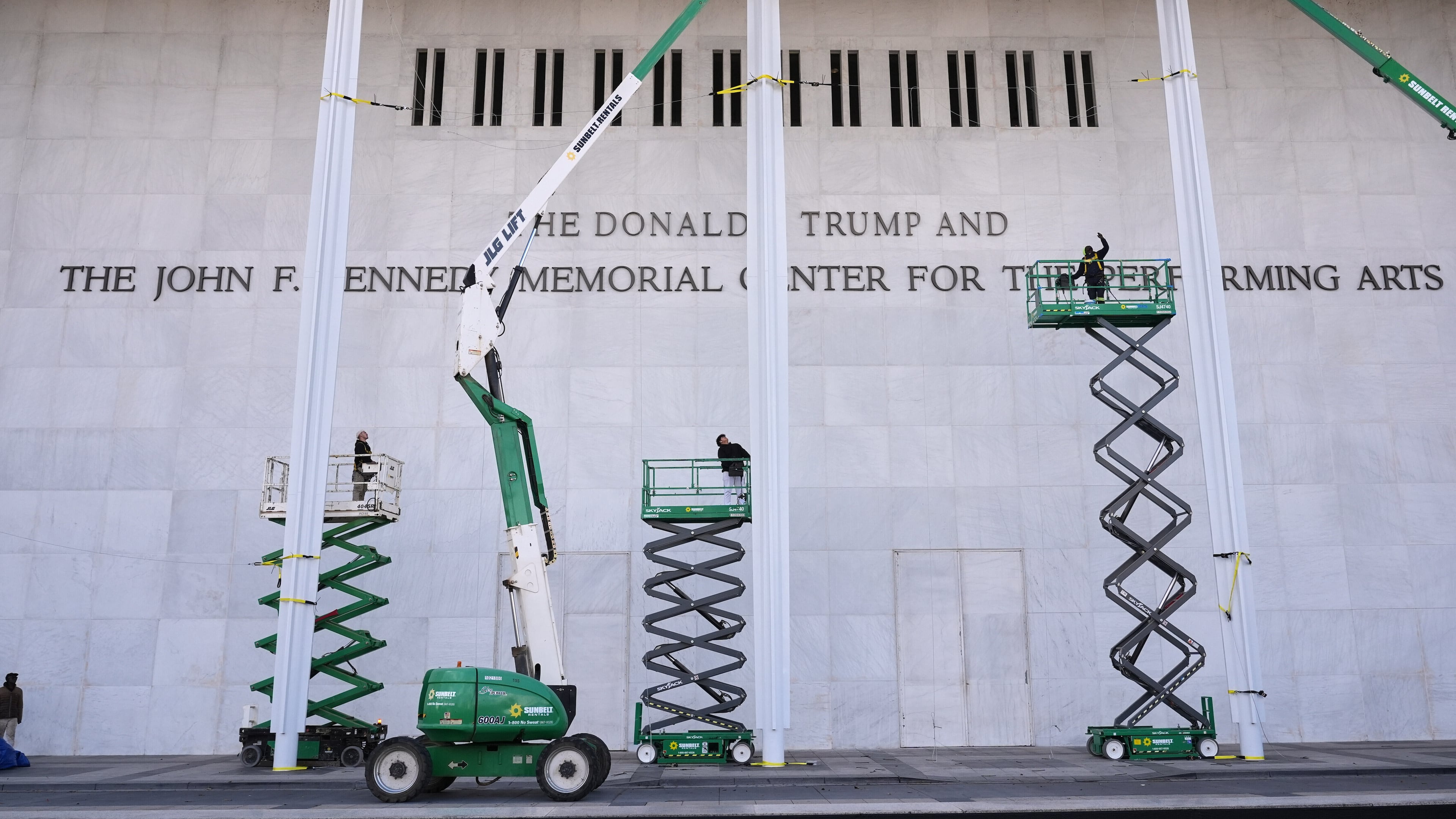 New signage, The Donald J. Trump and The John F. Kennedy Memorial Center For The Performing Arts, is unveiled on the Kennedy Center, Friday, Dec. 19, 2025, in Washington. (AP Photo/Jacquelyn Martin)