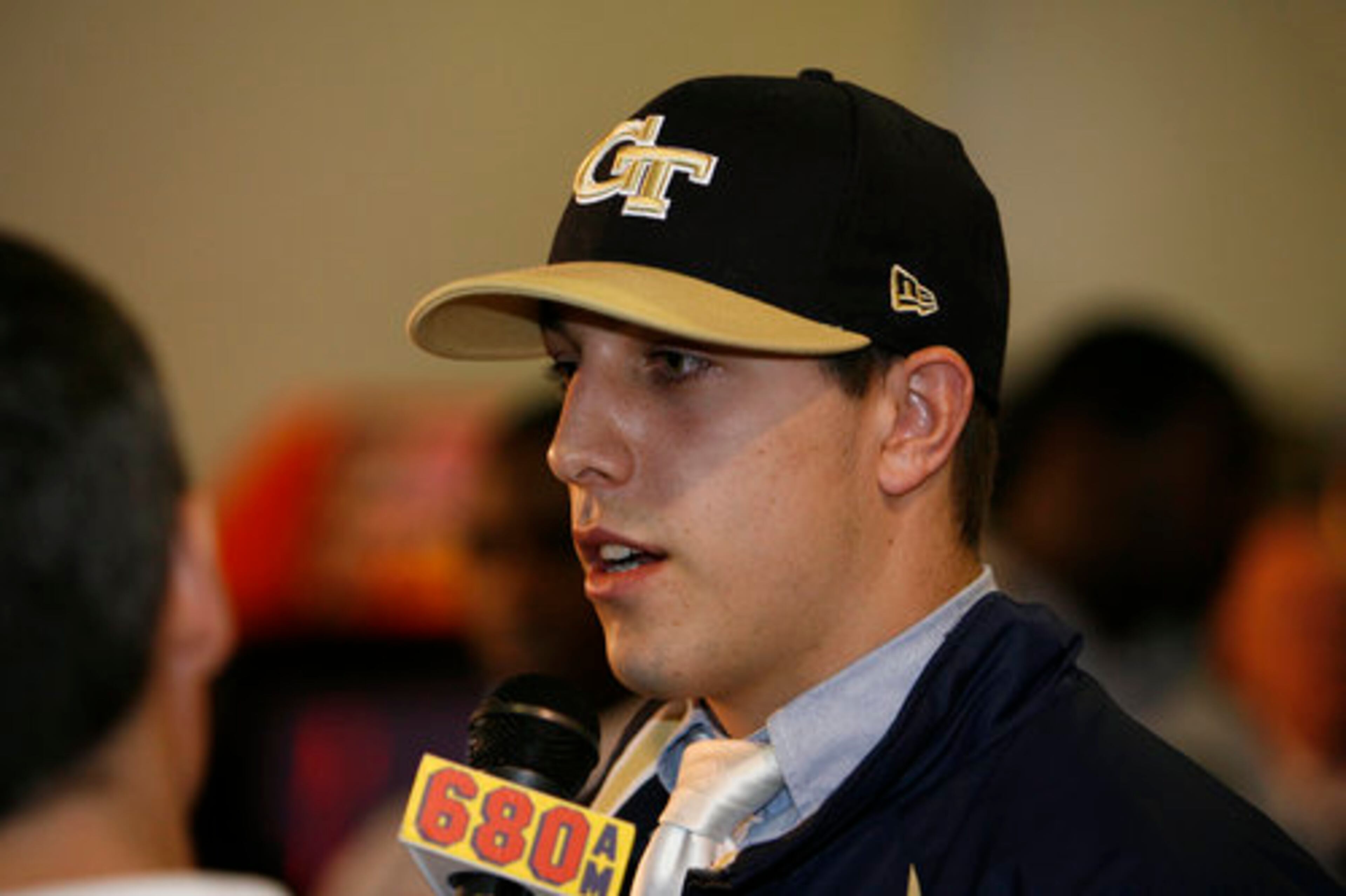 Jake Skole of Blessed Trinity signs with Ga Tech and plans to be a business major during the National Signing Day at Andretti Indoor Karting & Games in Roswell Wednesday, February 3, 2010.