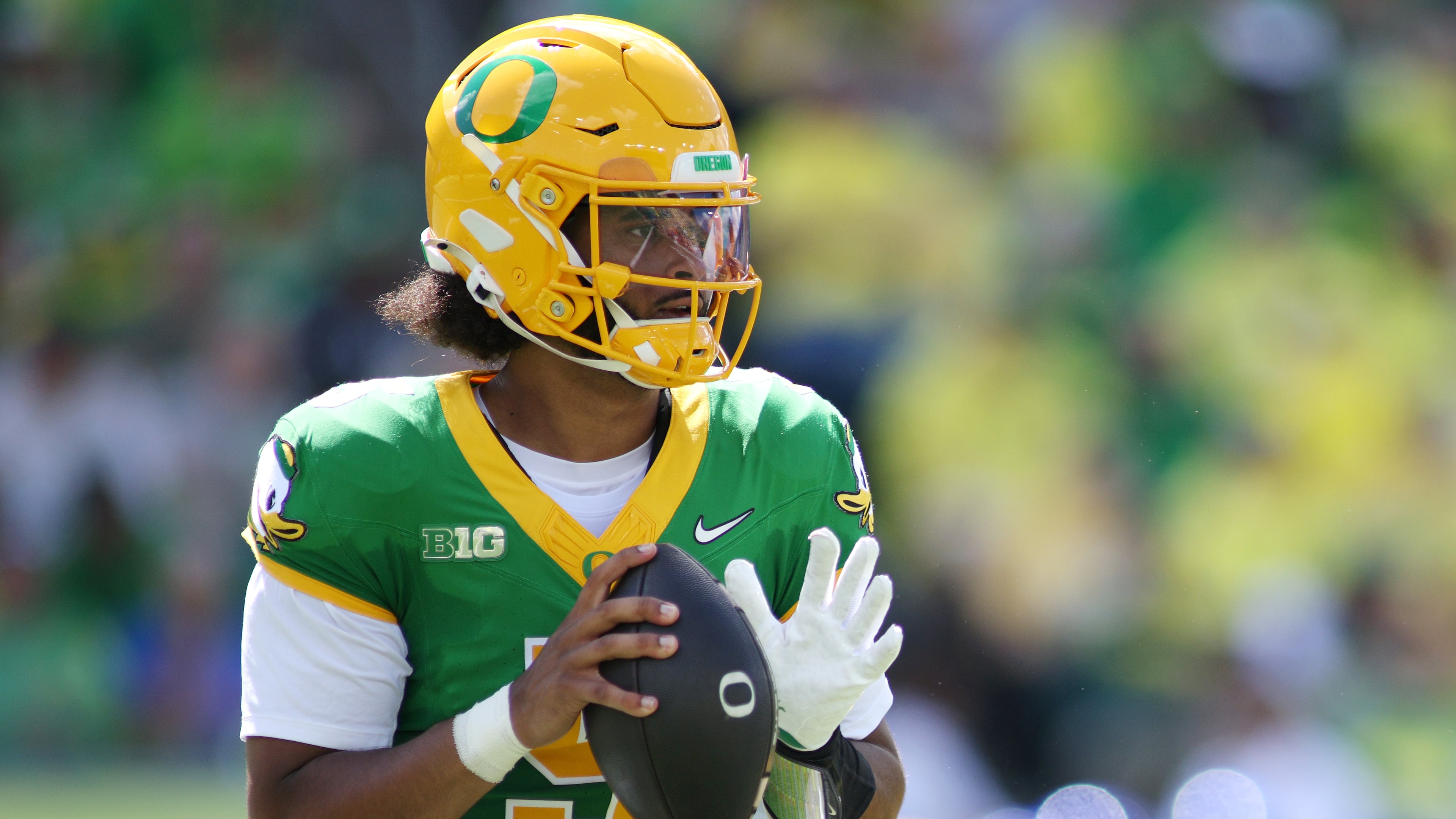 Oregon quarterback Dante Moore (5) looks to pass during the first half of an NCAA college football game against Boise State, Saturday, Sept. 5, 2026, in Eugene, Ore. (AP Photo/Lydia Ely)