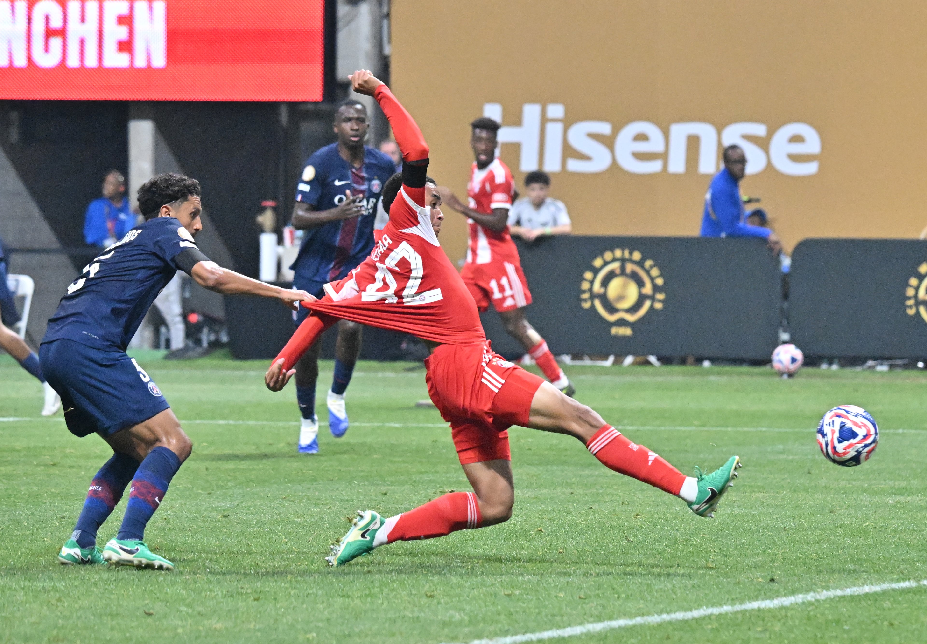 Bayern Munich midfielder Jamal Musiala (right) takes a shot as Paris Saint-Germain defender Marquinhos (left) defends during the first half of the Club World Cup quarterfinals match at Mercedes-Benz Stadium on Saturday, July 5, 2025, in Atlanta. (Hyosub Shin/AJC)