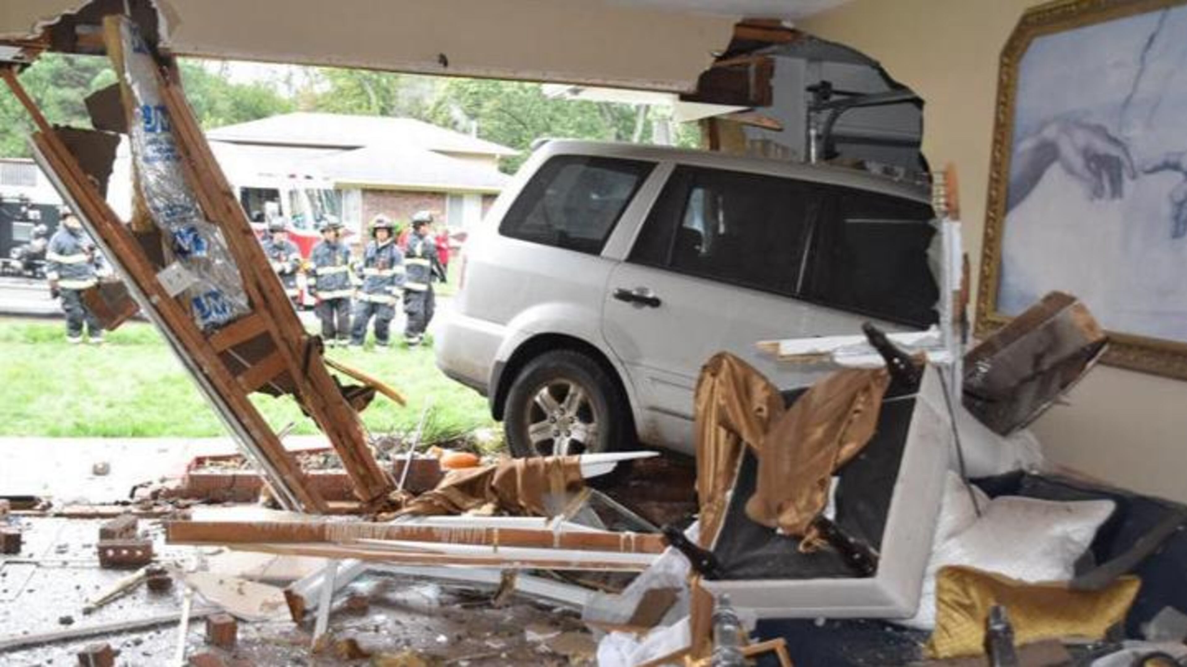 A woman driving an SUV crashed into an Indianapolis home early Monday.