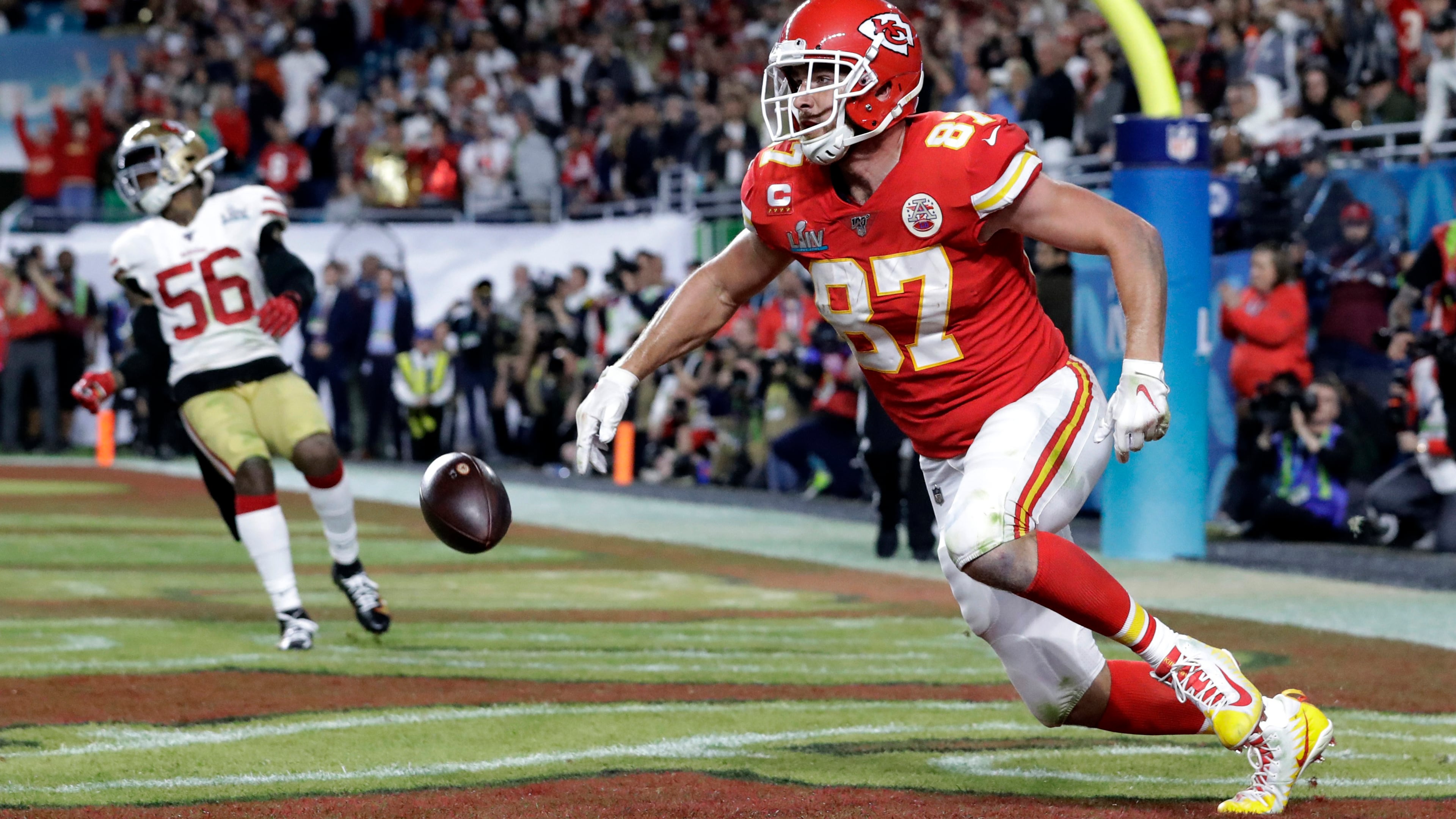 Kansas City Chiefs' Travis Kelce (87) scores against the San Francisco 49ers during the second half of Super Bowl 54 Sunday, Feb. 2, 2020, in Miami Gardens, Fla.