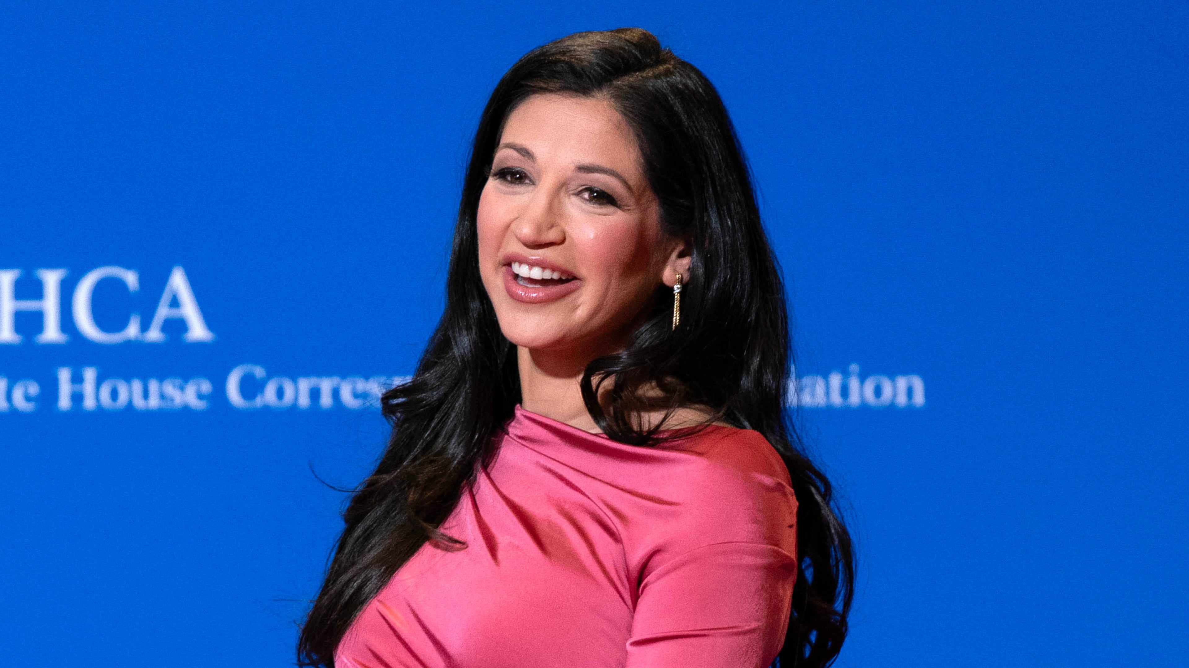 FILE - Katie Miller poses for photographers as she arrives at the annual White House Correspondents' Association Dinner in Washington, April 25, 2026. (AP Photo/Jose Luis Magana, File)