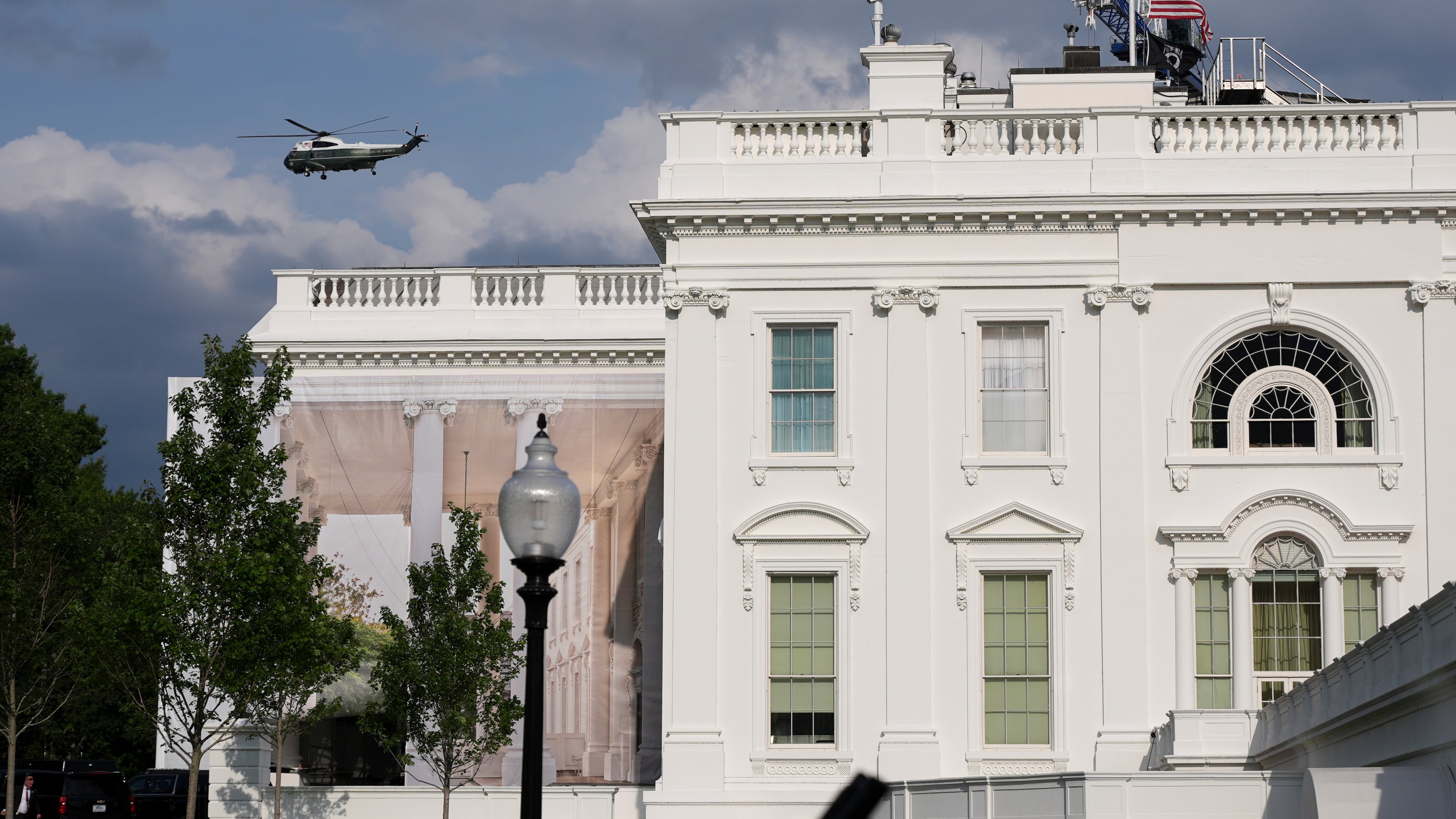 A helicopter from Marine Helicopter Squadron One, or HMX-1, flies past the White House after President Donald Trump arrived at the Ellipse near the White House, Friday, Aug. 28, 2026, in Washington, on return from Houston. (AP Photo/Jacquelyn Martin)