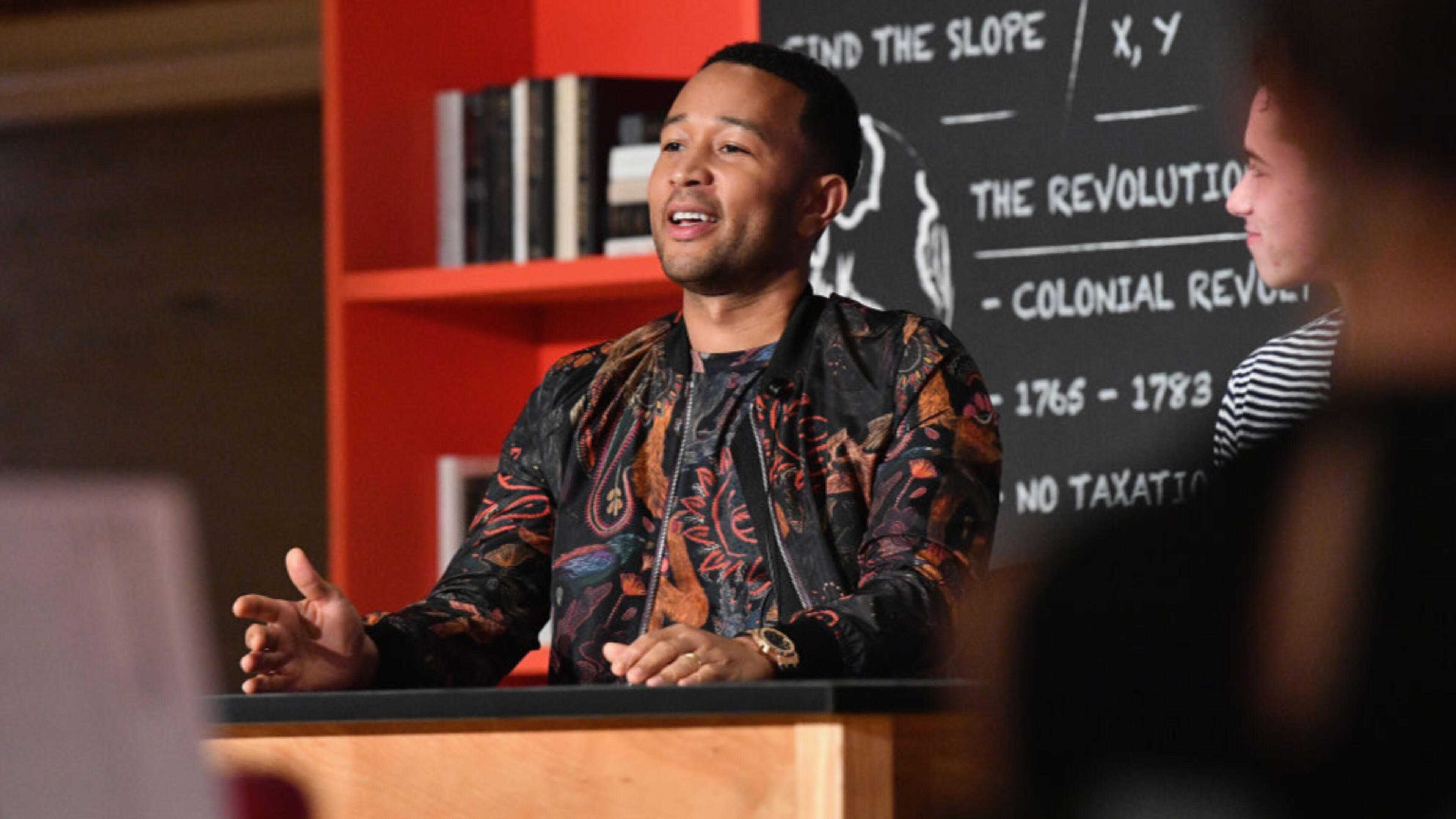 John Legend speaks onstage at the announcement of the AXE Senior Orientation program on August 23, 2017 in New York City. (Photo by Dia Dipasupil/Getty Images for Axe)