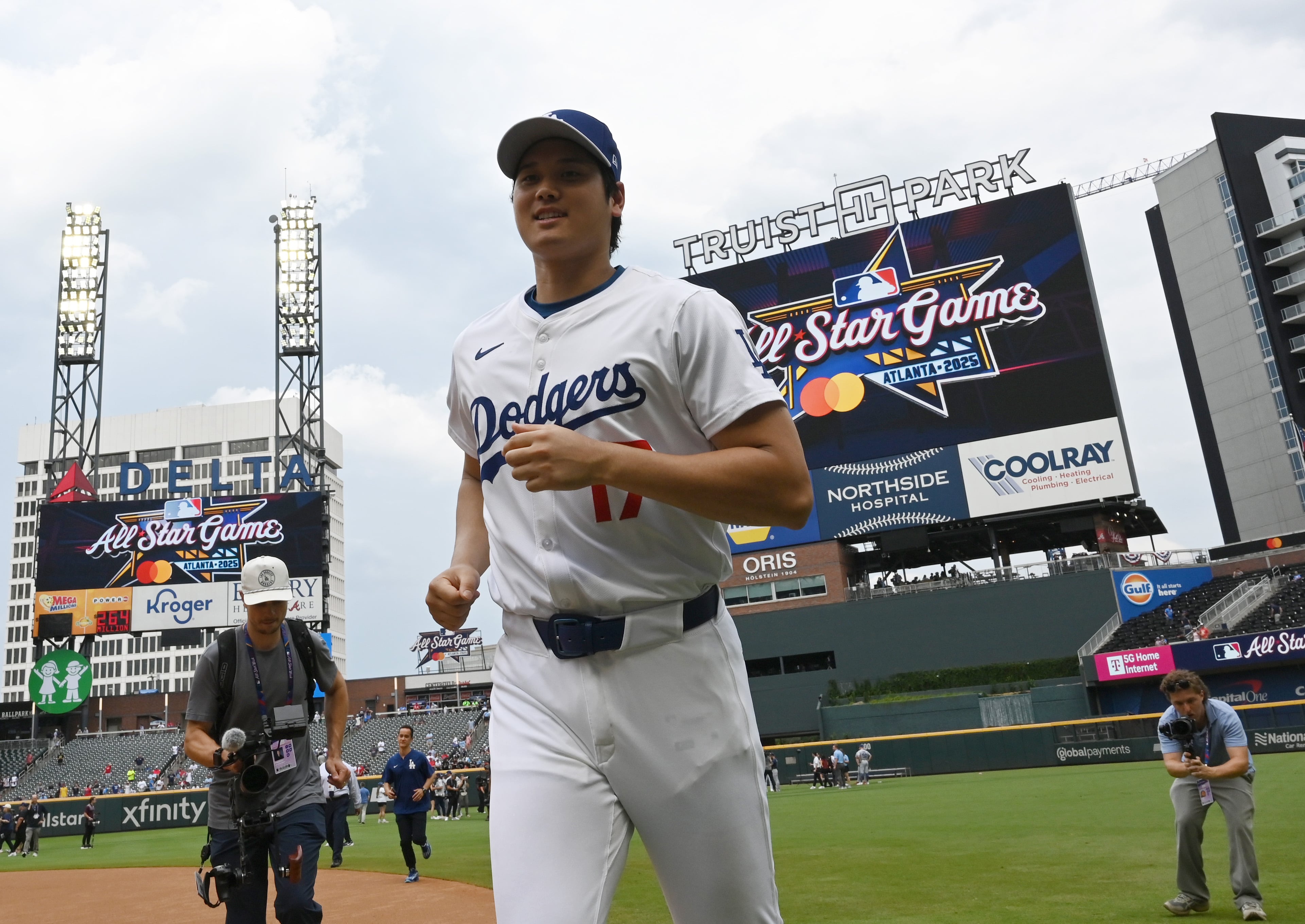Los Angeles Dodgers two-way player Shohei Ohtani walks onto the baseball field before the 2025 MLB All-Star Game at Truist Park, Tuesday, July 15, 2025, in Atlanta. (Hyosub Shin/AJC)