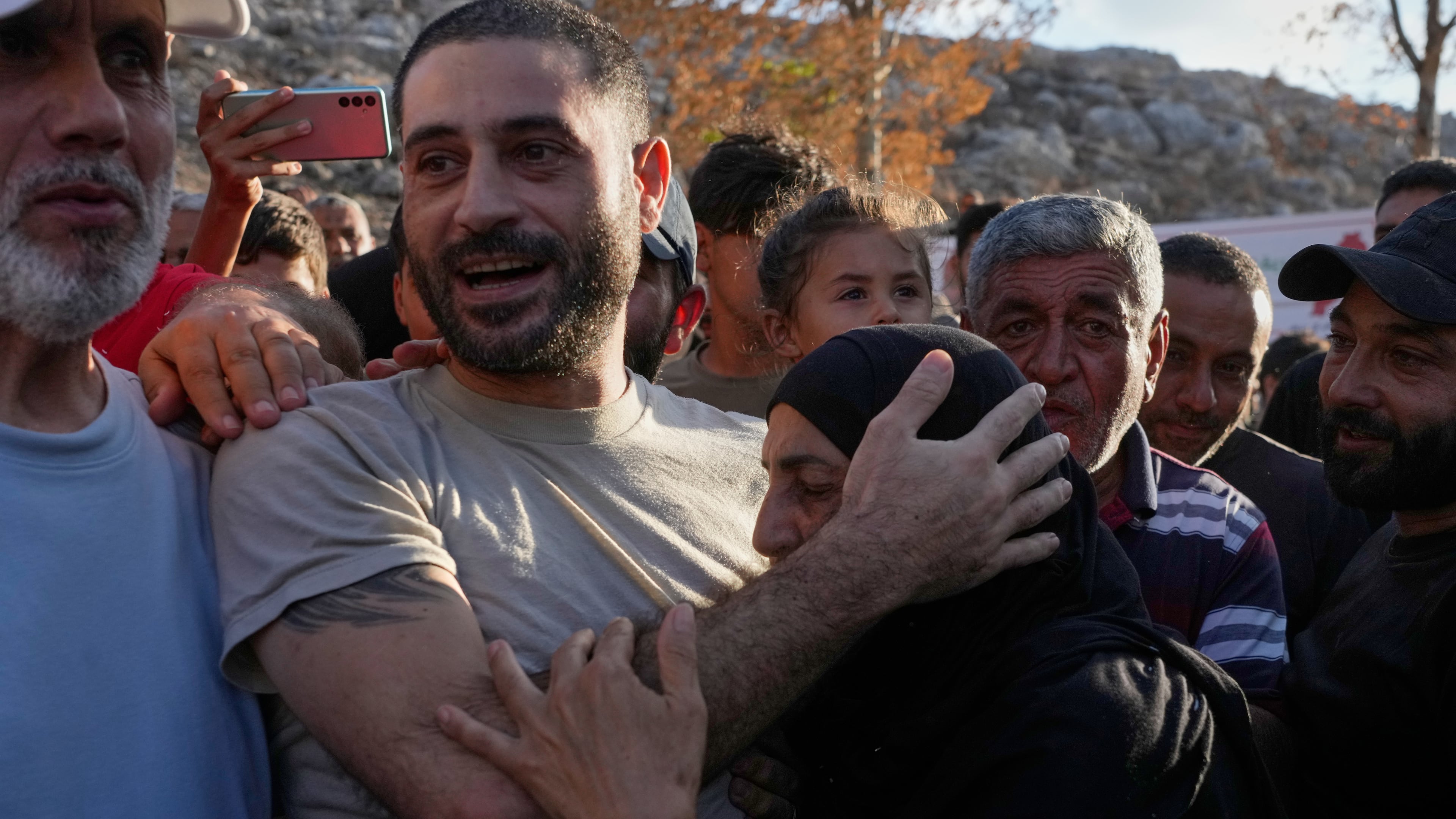 Hussein Ayash, who was released from an Israeli prison, hugs his mother as he arrives at his family home in the southern village of Harouf, Lebanon, Friday, Sept. 4, 2026. (AP Photo/Mohammed Zaatari)