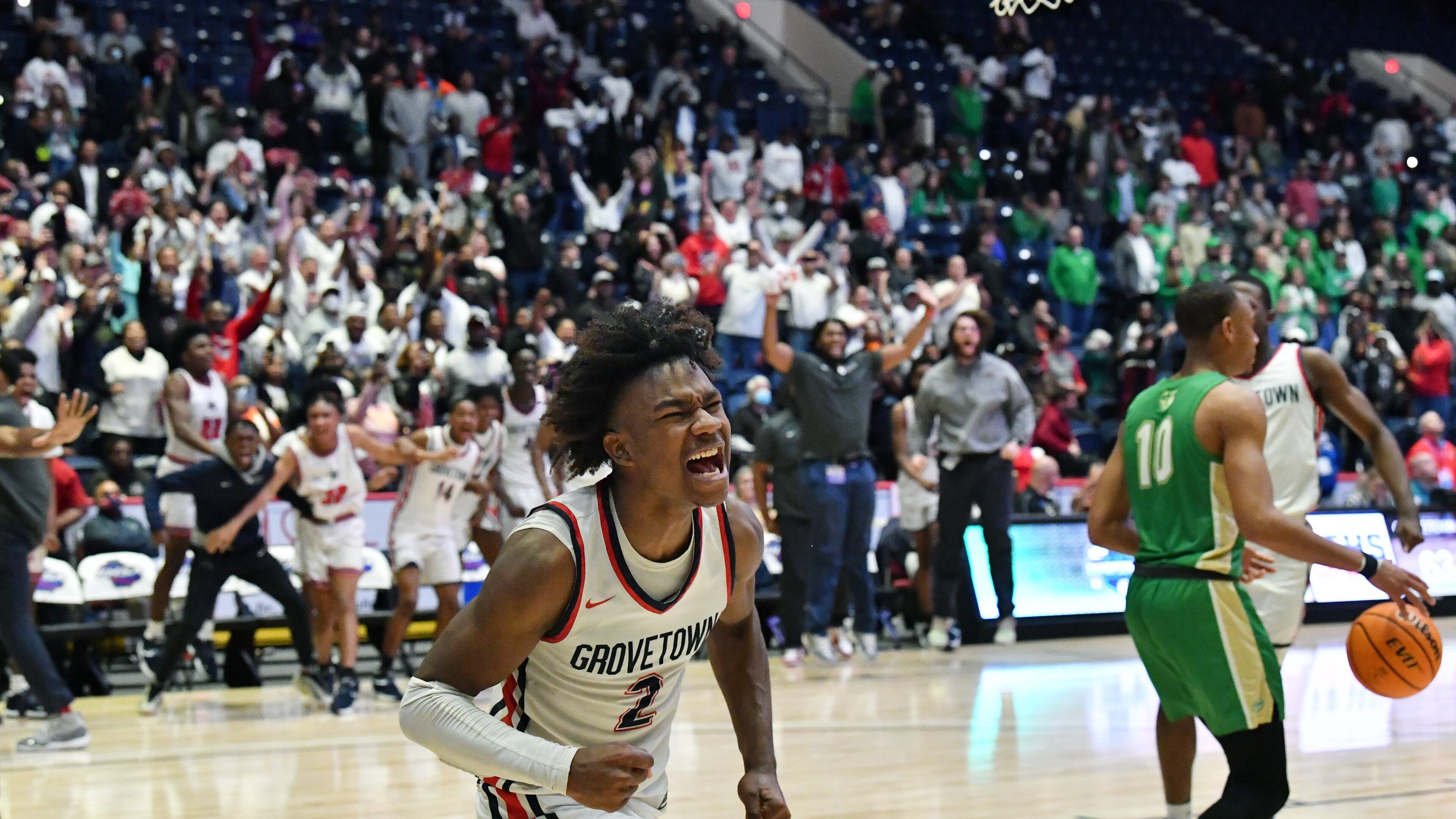 March 11, 2022 Macon - Grovetown's Frankquon Sherman (2) reacts after dunking the ball at the end of the 4th quarter during the 2022 GHSA State Basketball Class AAAAAA Boys Championship game at the Macon Centreplex in Macon on Friday, March 11, 2022. Grovetown won 66-59 over Buford. (Hyosub Shin / Hyosub.Shin@ajc.com)