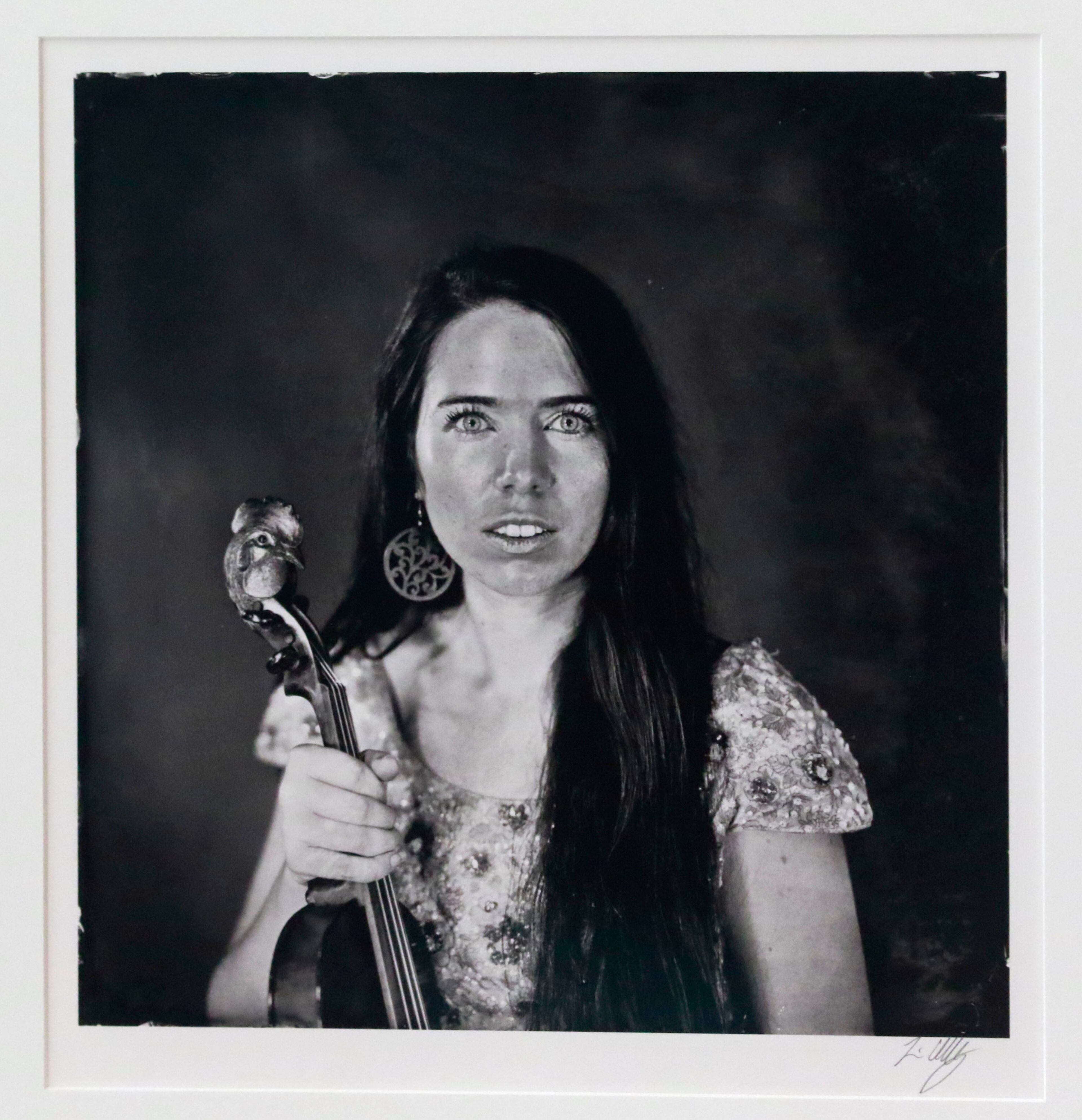 This photograph titled "Martha Spencer and Smokey, Appalachian Musician", Rugby, VA, 2015, is part of the exhibit. A Music Makers Relief Foundation art exhibit debuted in the airport atrium Friday with platinum palladium prints of blues musicians. For 35 years photographer Tim Duffy has photographed Southern musicians and the world in which they live using wet-plate collodion photography. BOB ANDRES / BANDRES@AJC.COM