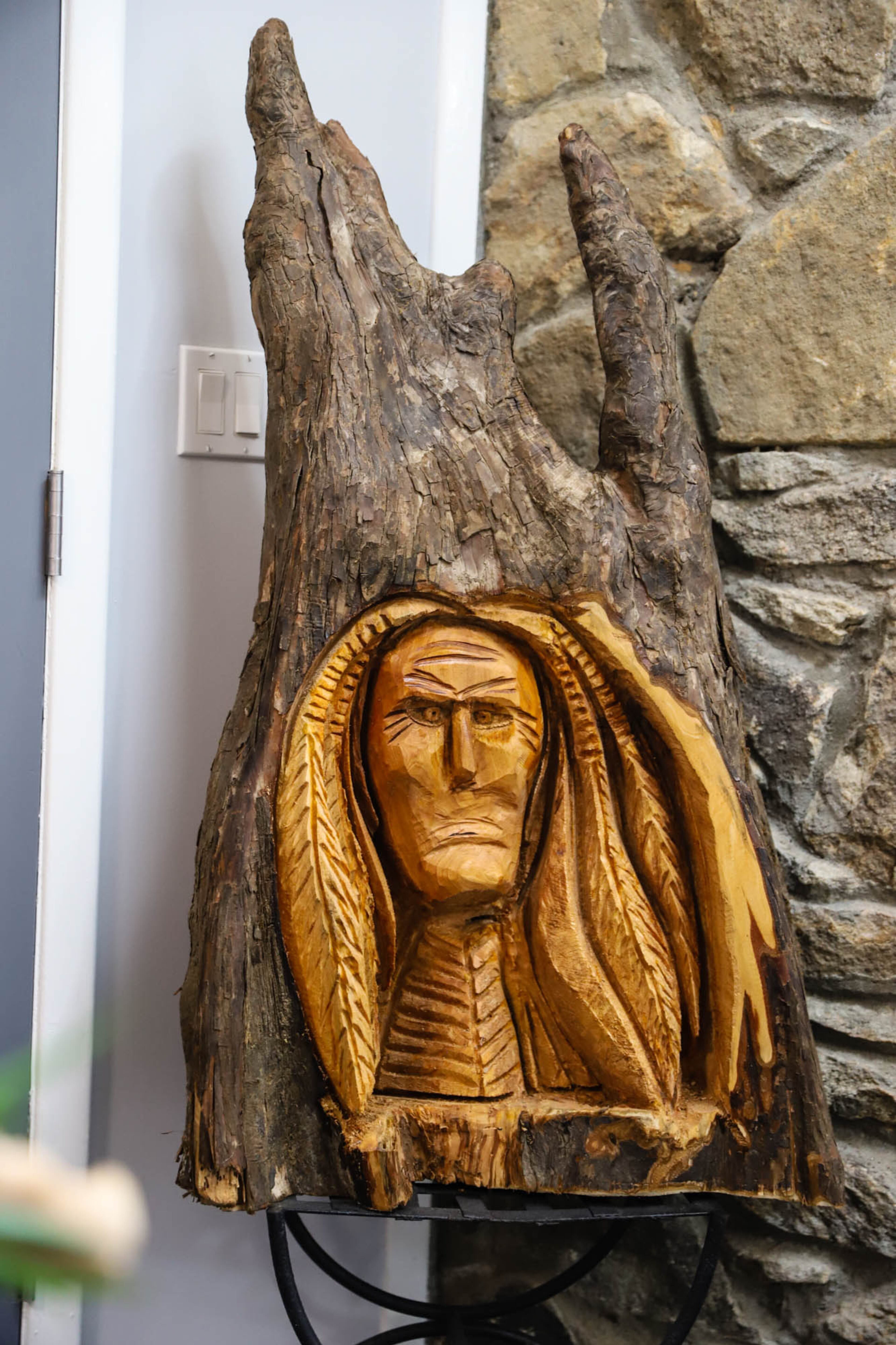 Natural wood pieces are among the Native American decor that the couple uses in their home.