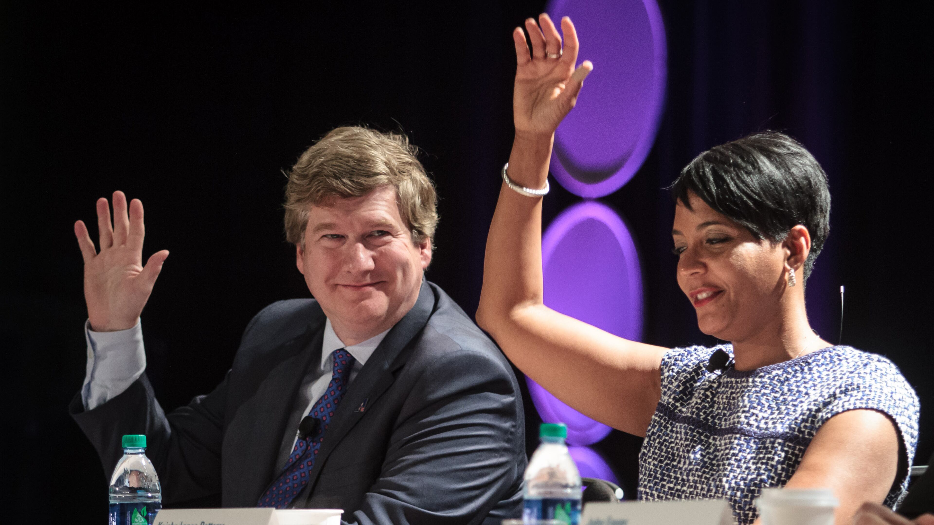 Atlanta mayoral candidates Peter Aman and Keisha Lance Bottoms answer questions at a forum. STEVE SCHAEFER / SPECIAL TO THE AJC