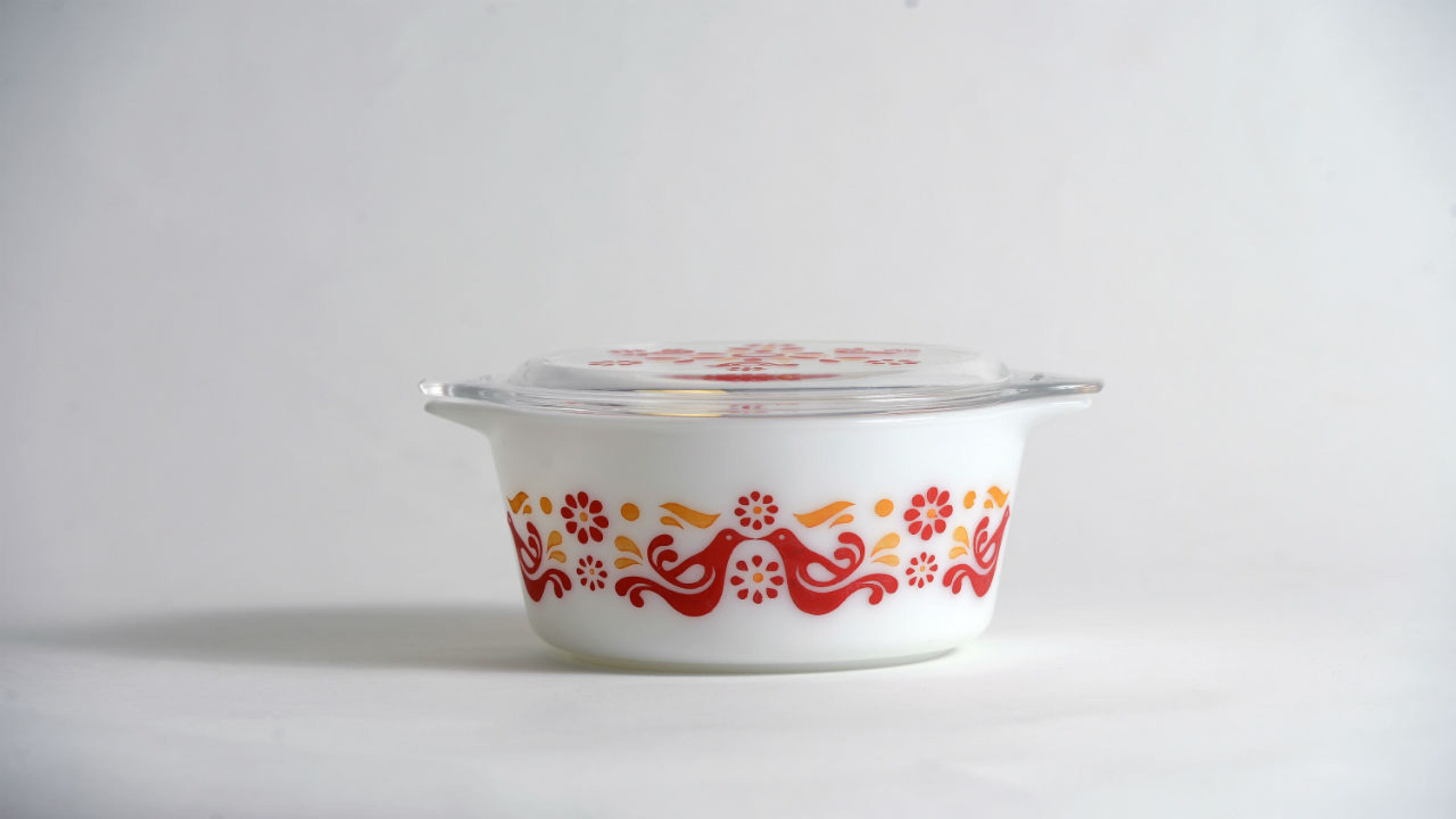 A British woman was convicted of killing her half-sister last spring with a chicken-shaped kitchen pot and sentenced to life in prison.