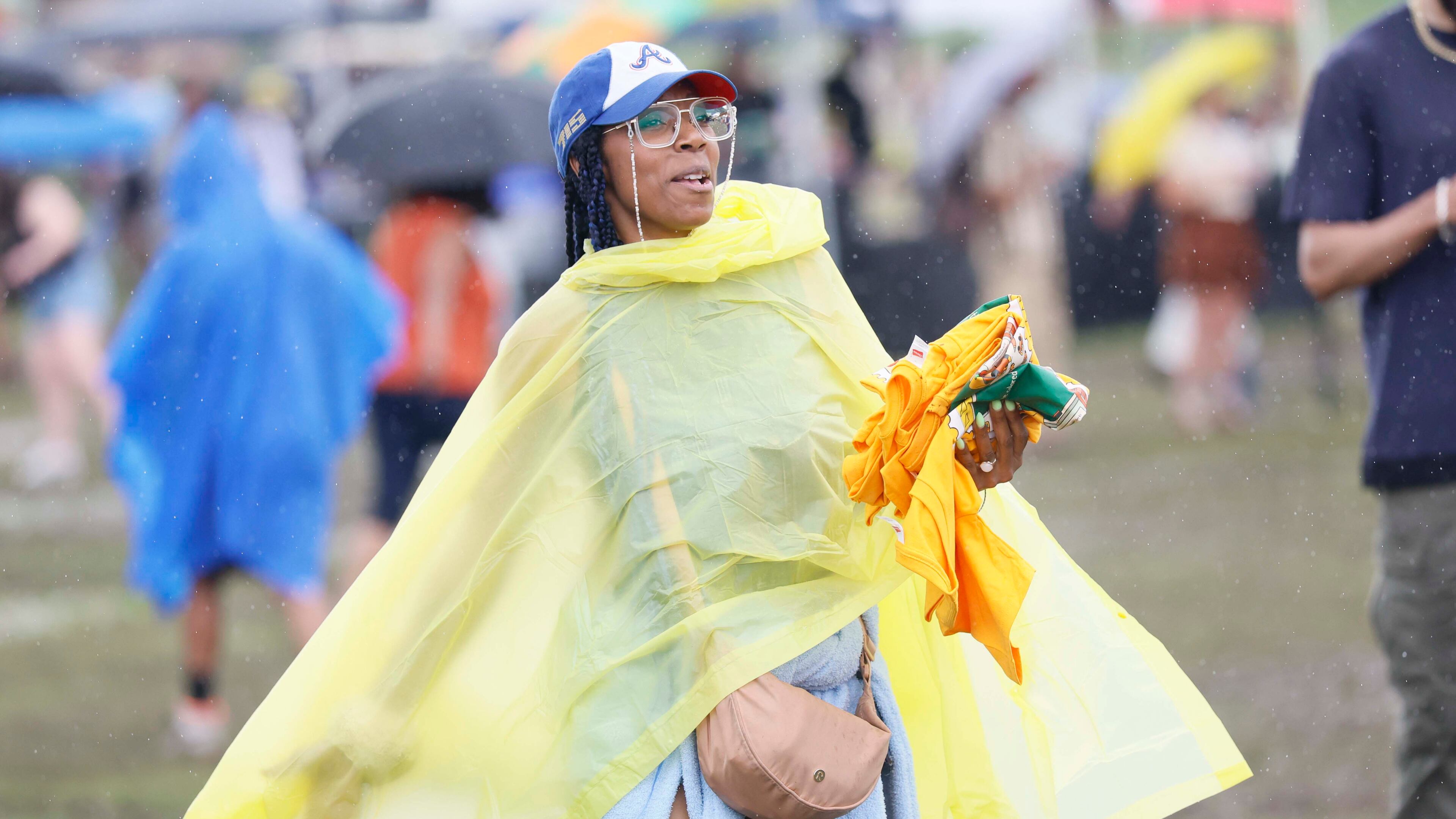 Fans heading downtown for the World Cup game or other festivities Thursday should bring an umbrella or rain poncho as heavy downpours are expected. (Miguel Martinez/AJC)