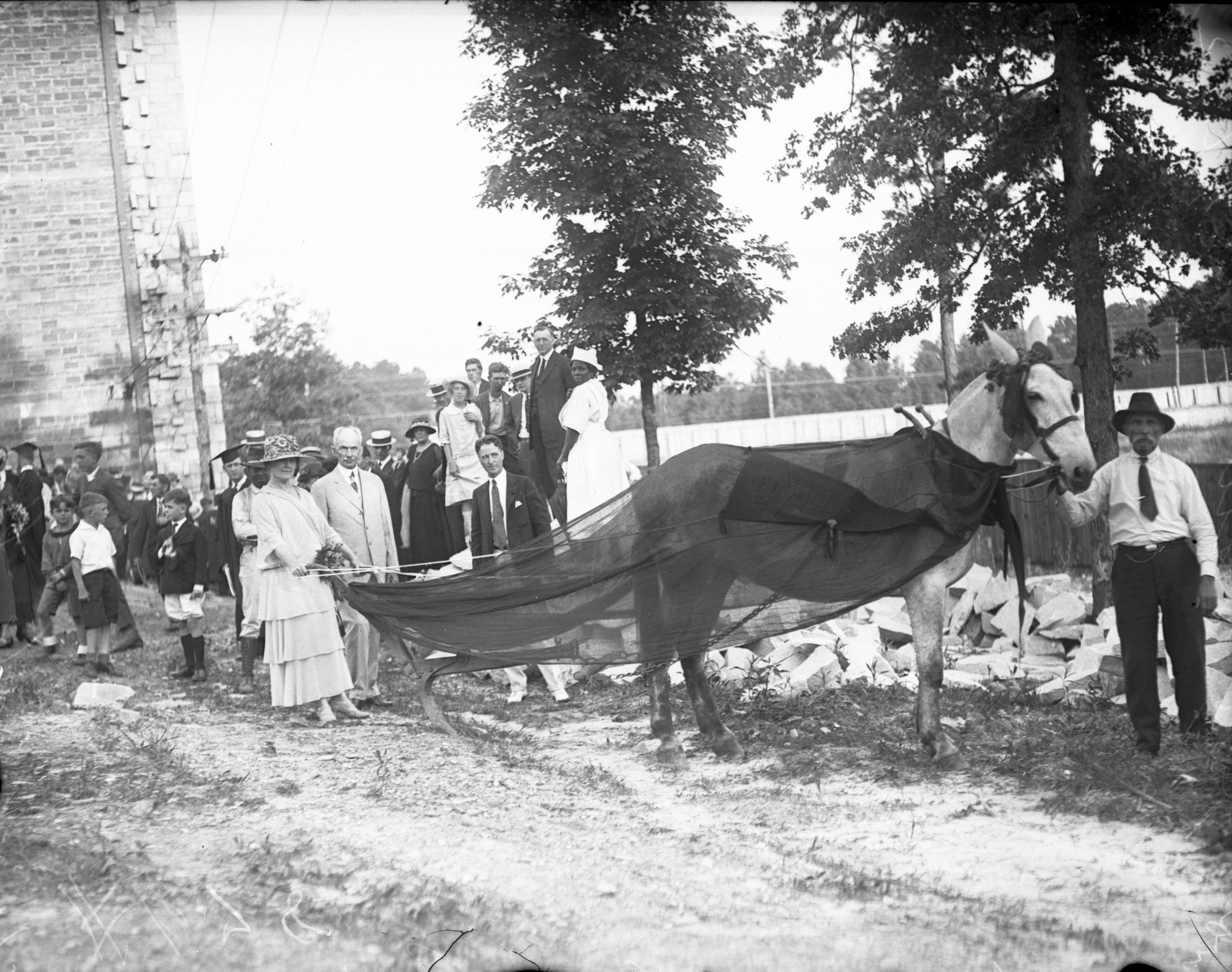 Oglethorpe University benefactor John T. Lupton and his wife, Elizabeth Patten Lupton at an on-campus ceremony in the late 1920s. LBGlass - 057, Lane Brothers Commercial Photographers Photographic Collection, 1920-1976. Photographic Collection, Special Collections and Archives, Georgia State University Library.