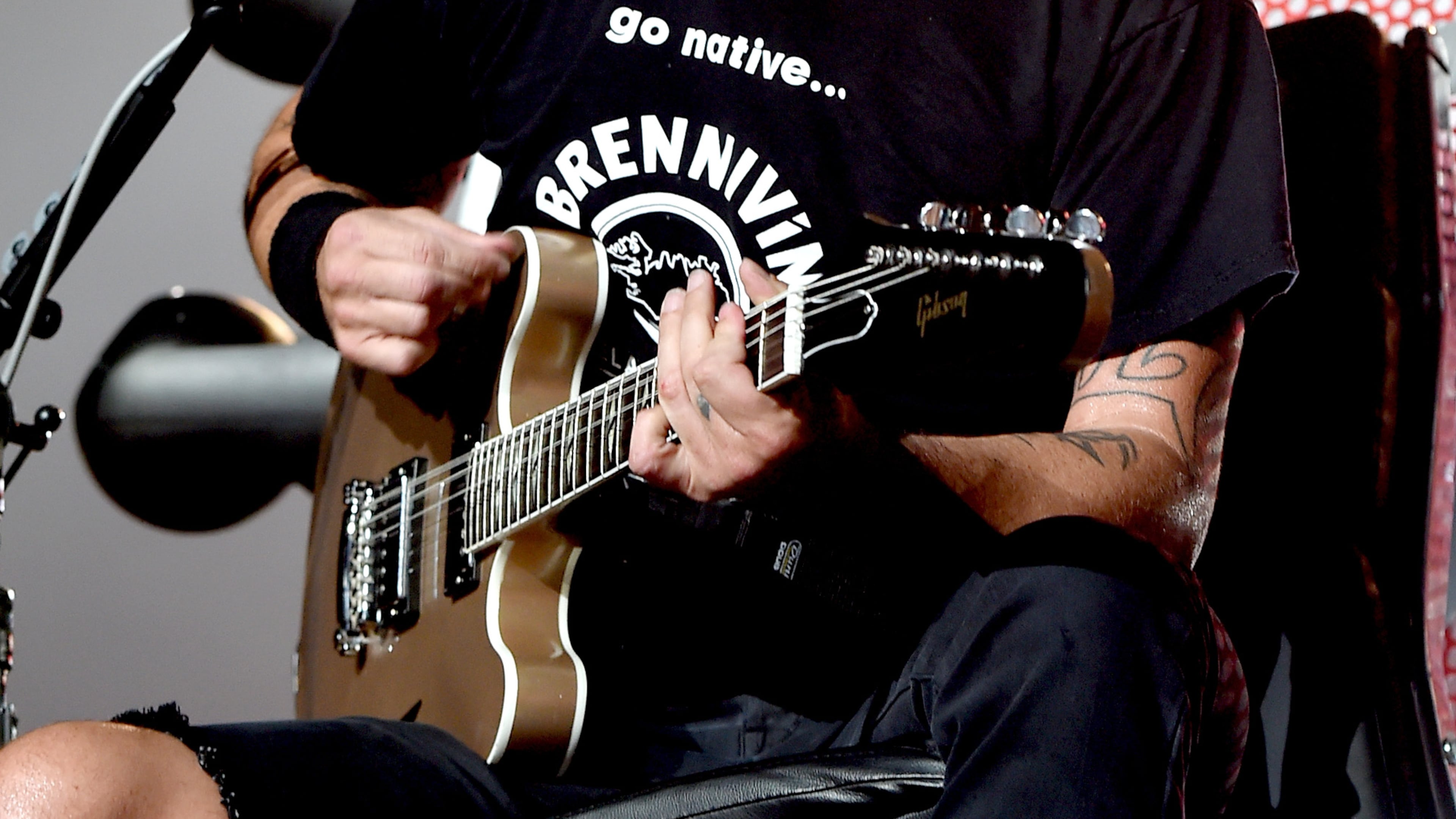 A bum leg can't keep Dave Grohl from rockin'. (Photo by Kevin Winter/Getty Images)