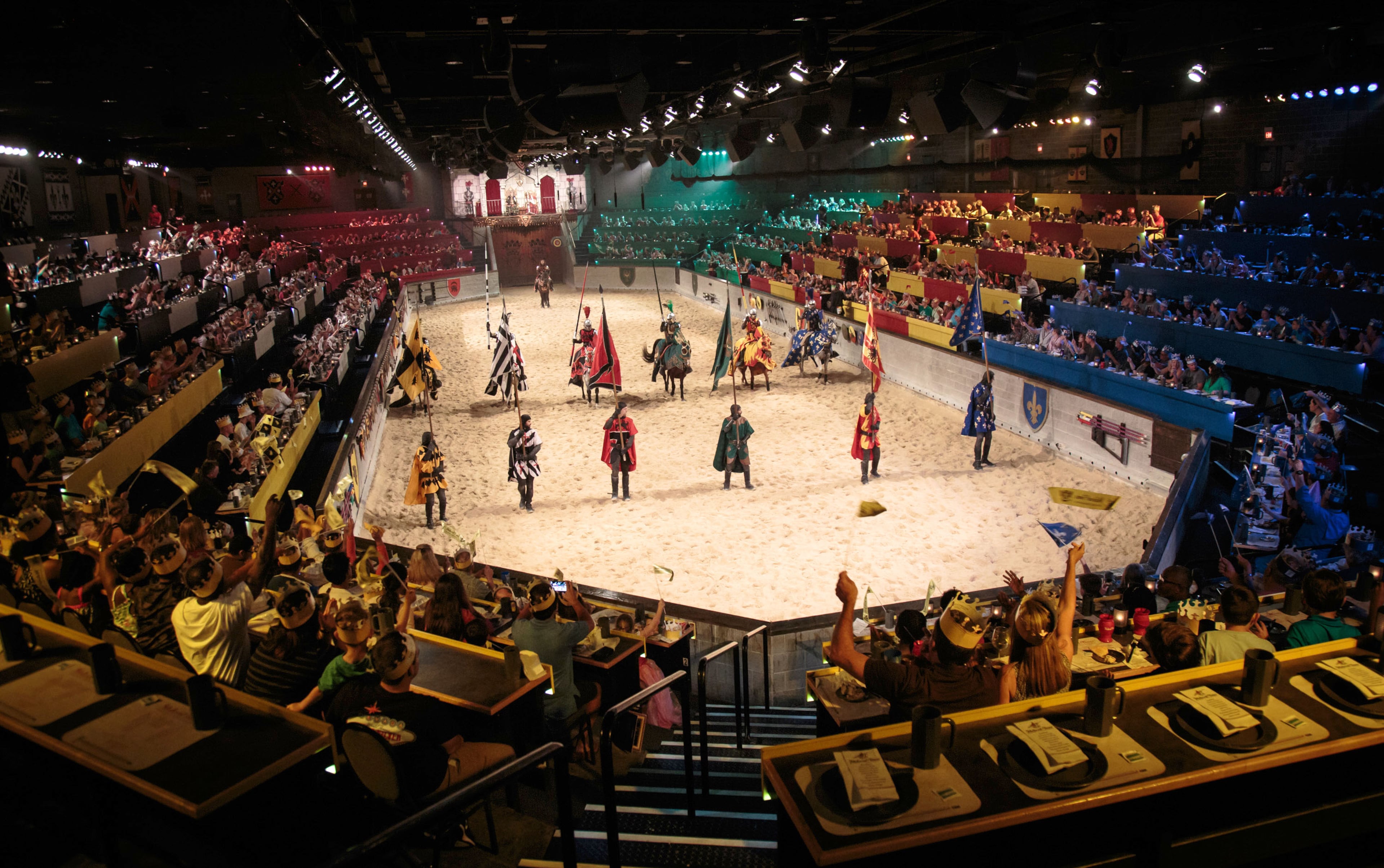 The Knights of the Realm enter the arena during the Medieval Times Dinner & Tournament in their 70,000 square-foot facility in Lawrenceville, Ga. Saturday, July 2, 2016. STEVE SCHAEFER / SPECIAL TO THE AJC