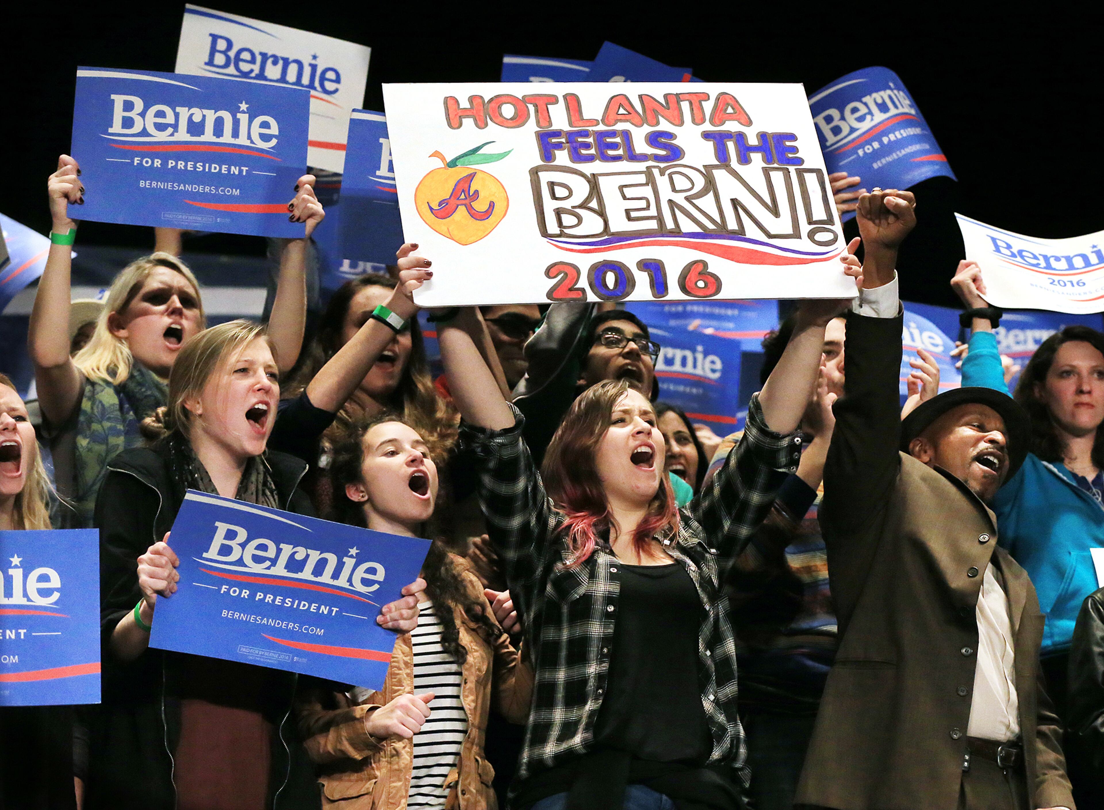 Supporters cheer for Democratic Presidential candidate Bernie Sanders as he speaks to the packed crowd filling the Fox Theatre on Monday, Nov. 23, 2015, in Atlanta. Curtis Compton /