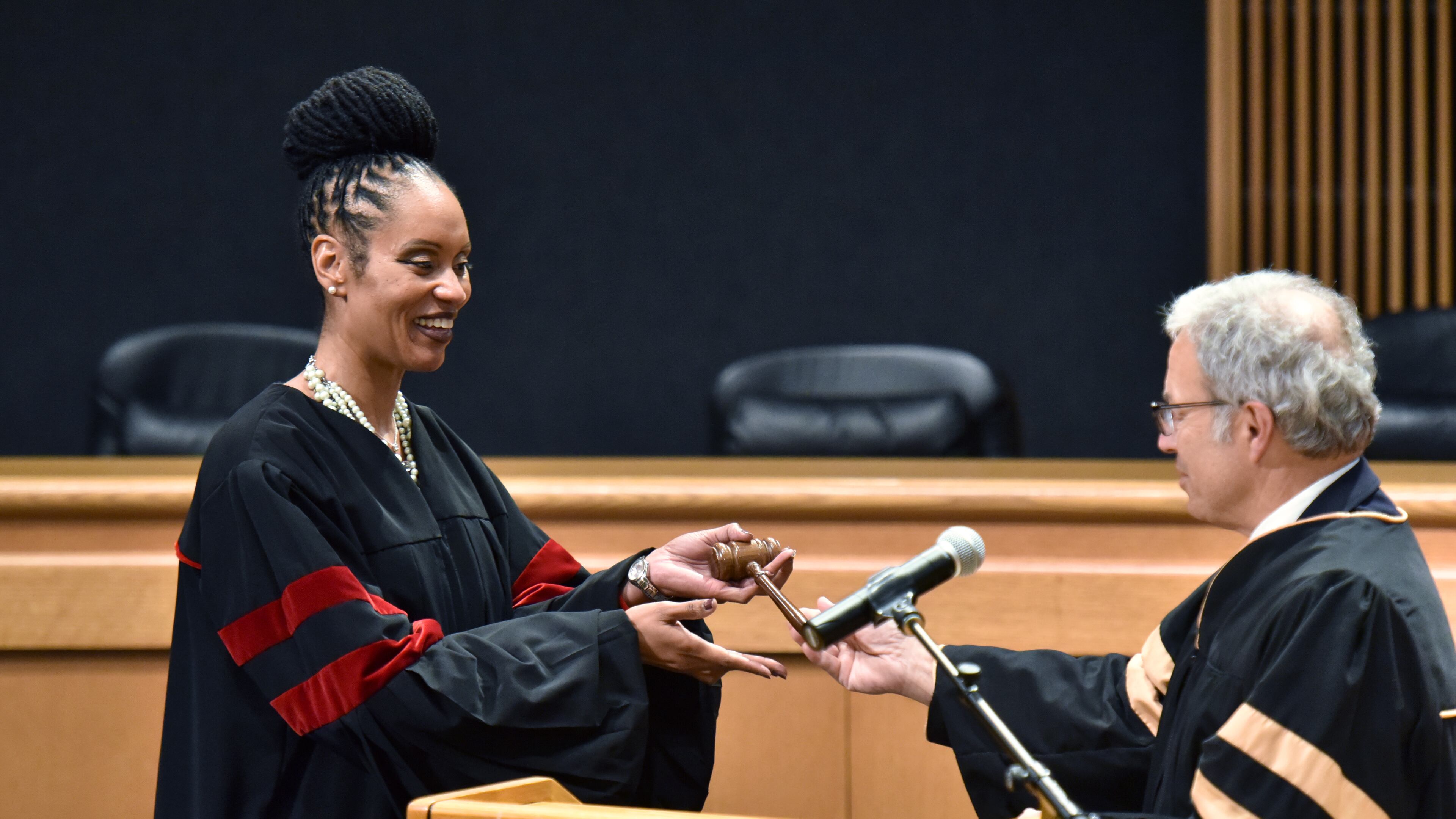 September 27, 2018 Lawrenceville - Gwinnett County State Court judge Ronda Colvin-Leary (left) receives a gavel from State Court Judge Joseph C. Iannazzone after she was sworn-in at the Gwinnett Justice and Administration Center on Thursday, September 27, 2018. Ronda Colvin-Leary was sworn in as a Gwinnett County State Court judge. She is the first African-American candidate to be elected to a countywide Gwinnett seat, as well as the first African-American to be elected to Gwinnett's state court bench. HYOSUB SHIN / HSHIN@AJC.COM