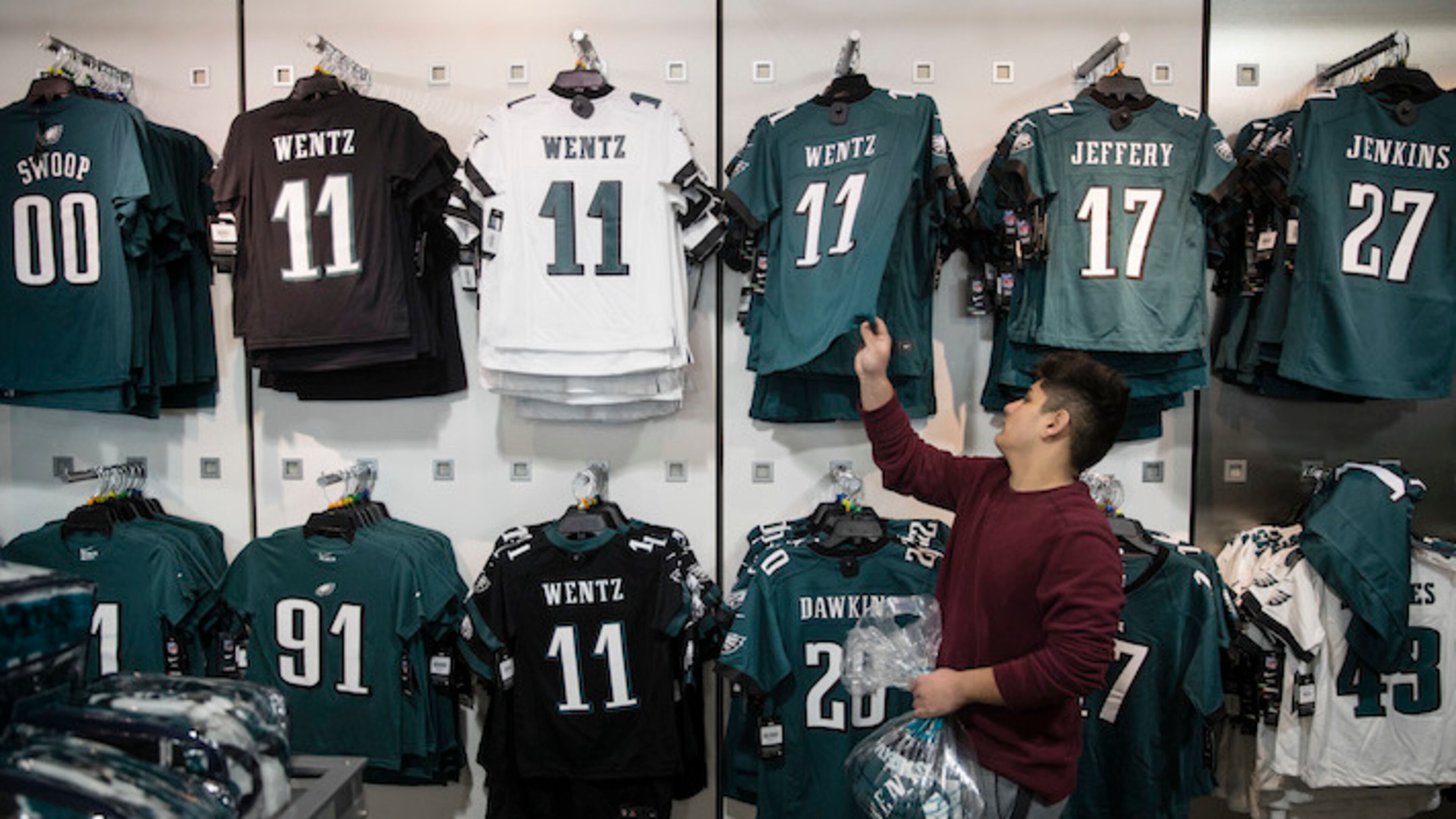 A fan shops for Philadelphia Eagles apparel in Philadelphia, Monday, Jan. 22, 2018. The Eagles defeated the Minnesota Vikings 38-7 in the AFC Championship on Sunday to advance to the Super Bowl against the New England Patriots. (AP Photo/Matt Rourke)