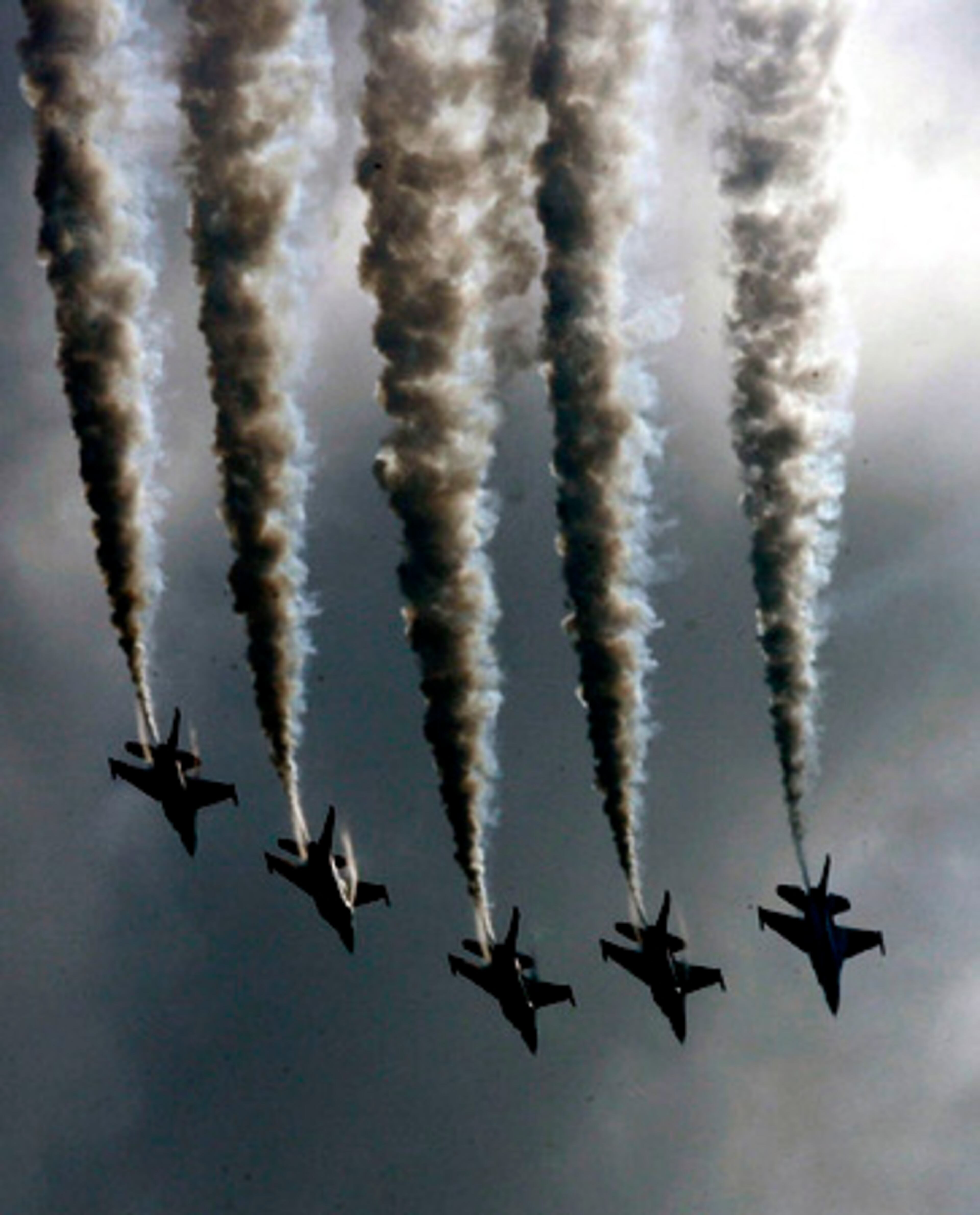 The Black Knights aerobatic team from the Republic of Singapore Air Force fly F16C Fighting Falcons during an air show in Bangkok, Thailand, on Thursday. The show is part of celebrations to mark the 25th anniversary of the relationship between the Thai and Singaporean Air Forces.