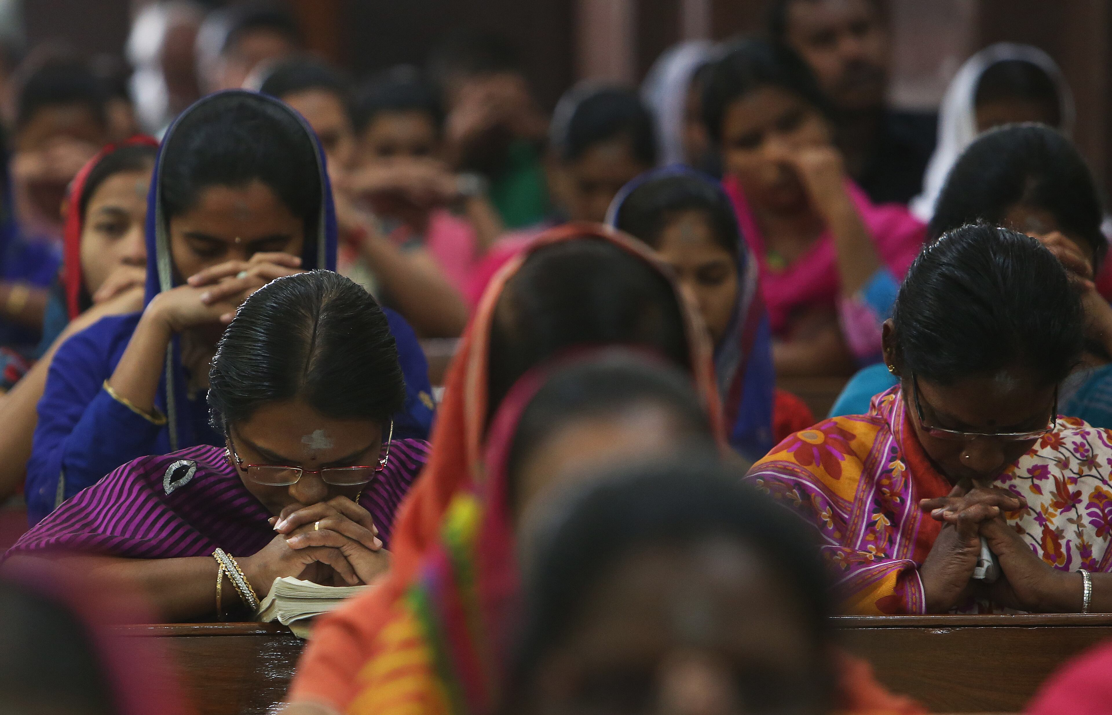 Indian catholic devotees offer prayers during a mass in observance of Ash Wednesday at the St. Joseph Cathedral in Hyderabad, India, Wednesday, Feb. 10, 2016. The Ash Wednesday marks the beginning of Lent, a solemn period of 40 days of prayer and self-denial leading up to Easter. (AP Photo/Mahesh Kumar A.)