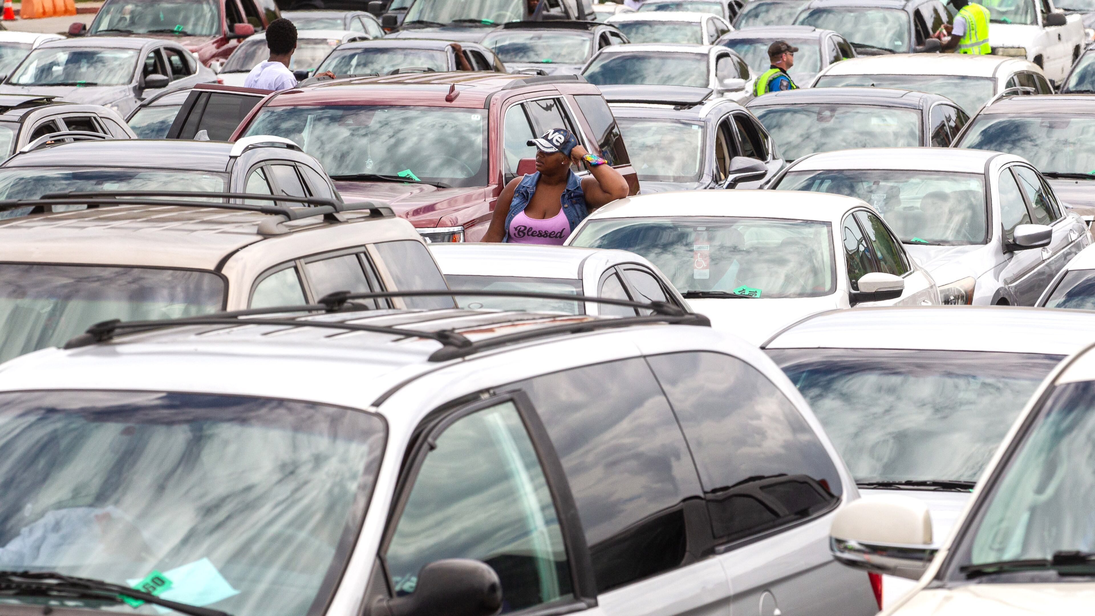 People wait in line to receive their COVID vaccinations at the Mall at Stonecrest on Saturday, August 28, 2021. One DeKalb resident said she ended up waiting more than six hours for her first dose. STEVE SCHAEFER FOR THE ATLANTA JOURNAL-CONSTITUTION