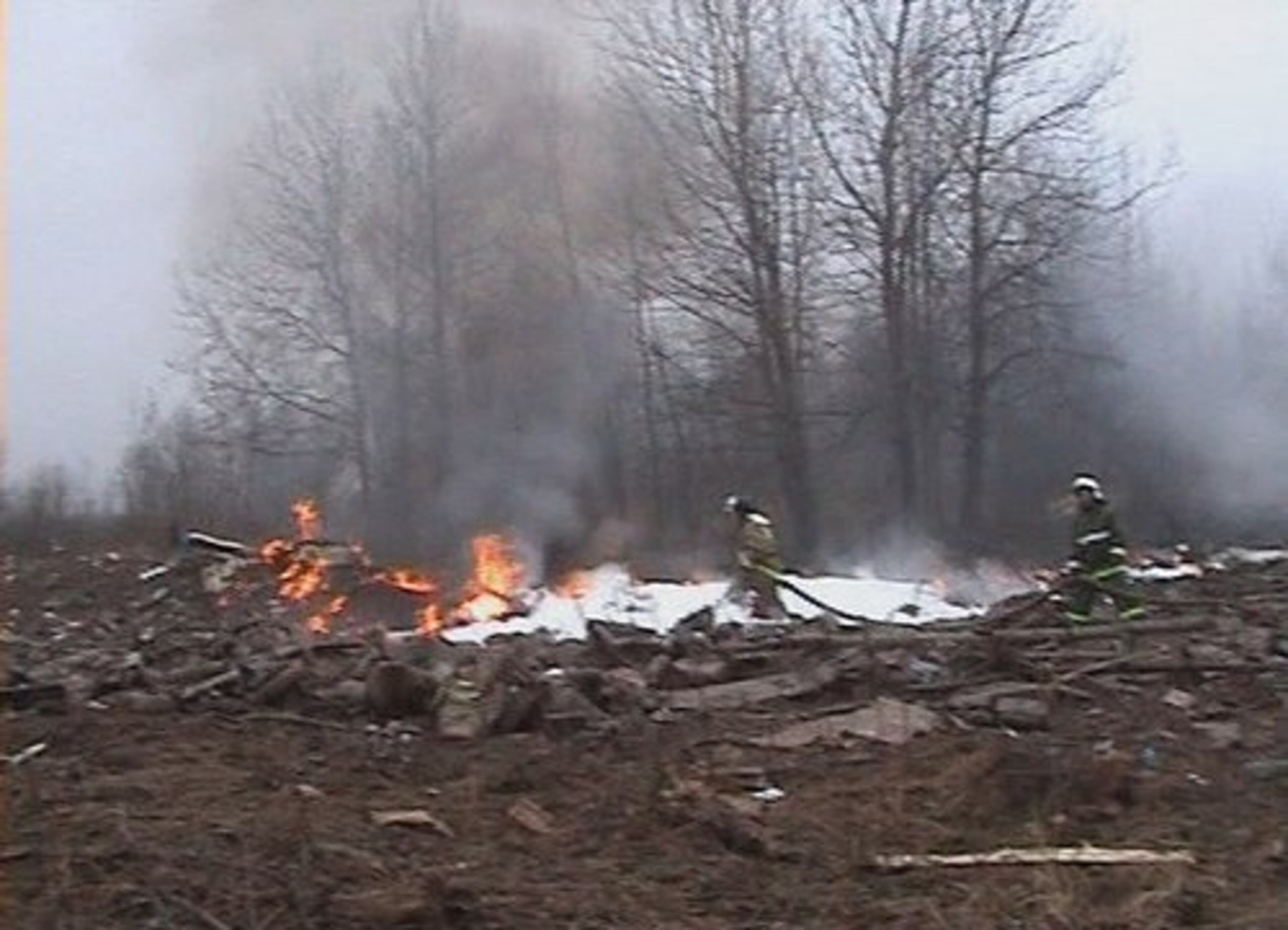 Emergency crews work at the site of the crash.
