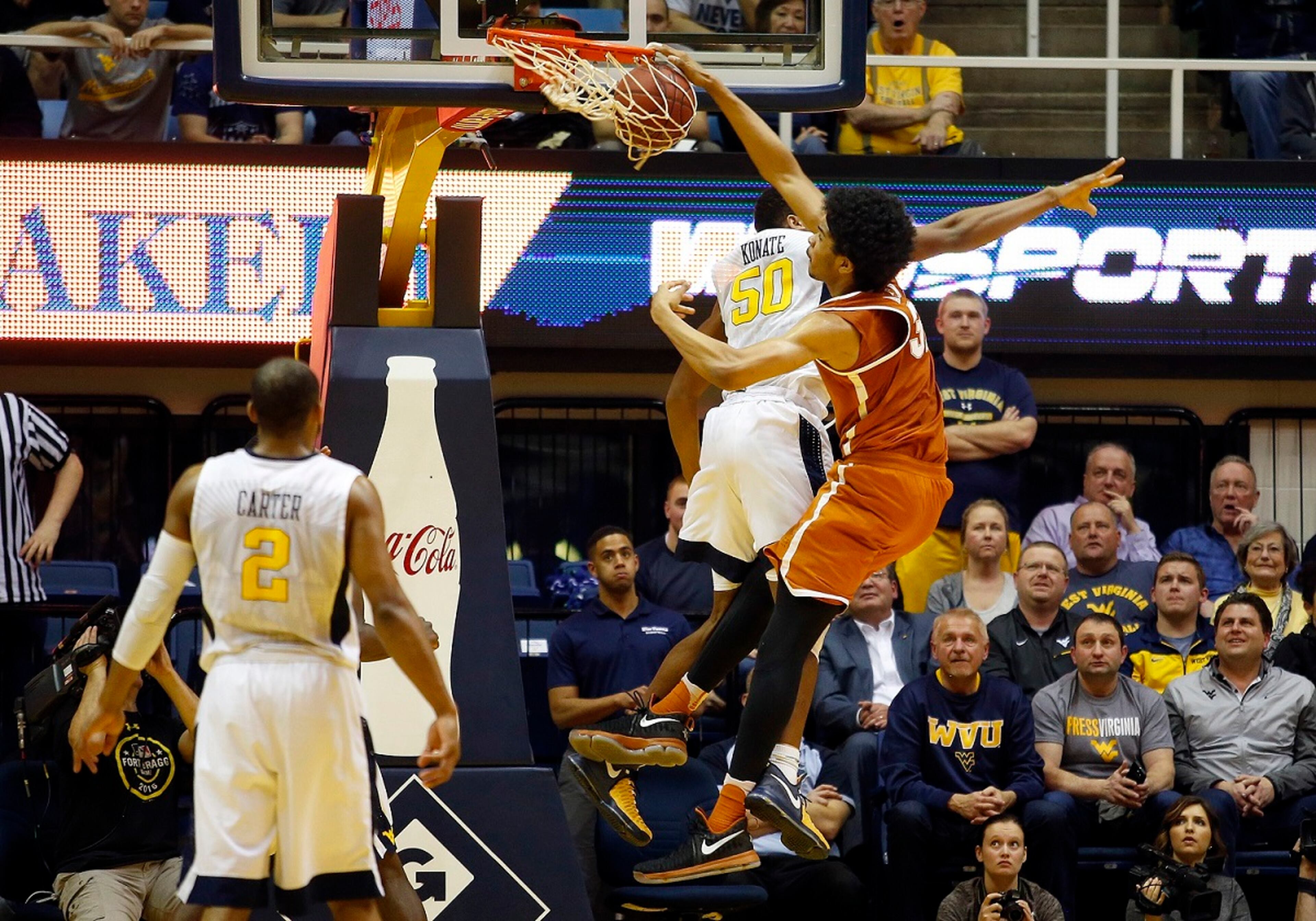 MORGANTOWN, WV - FEBRUARY 20: Jarrett Allen #31 of the Texas Longhorns dunks against Sagaba Konate #50 of the West Virginia Mountaineers at the WVU Coliseum on February 20, 2017 in Morgantown, West Virginia. (Photo by Justin K. Aller/Getty Images)