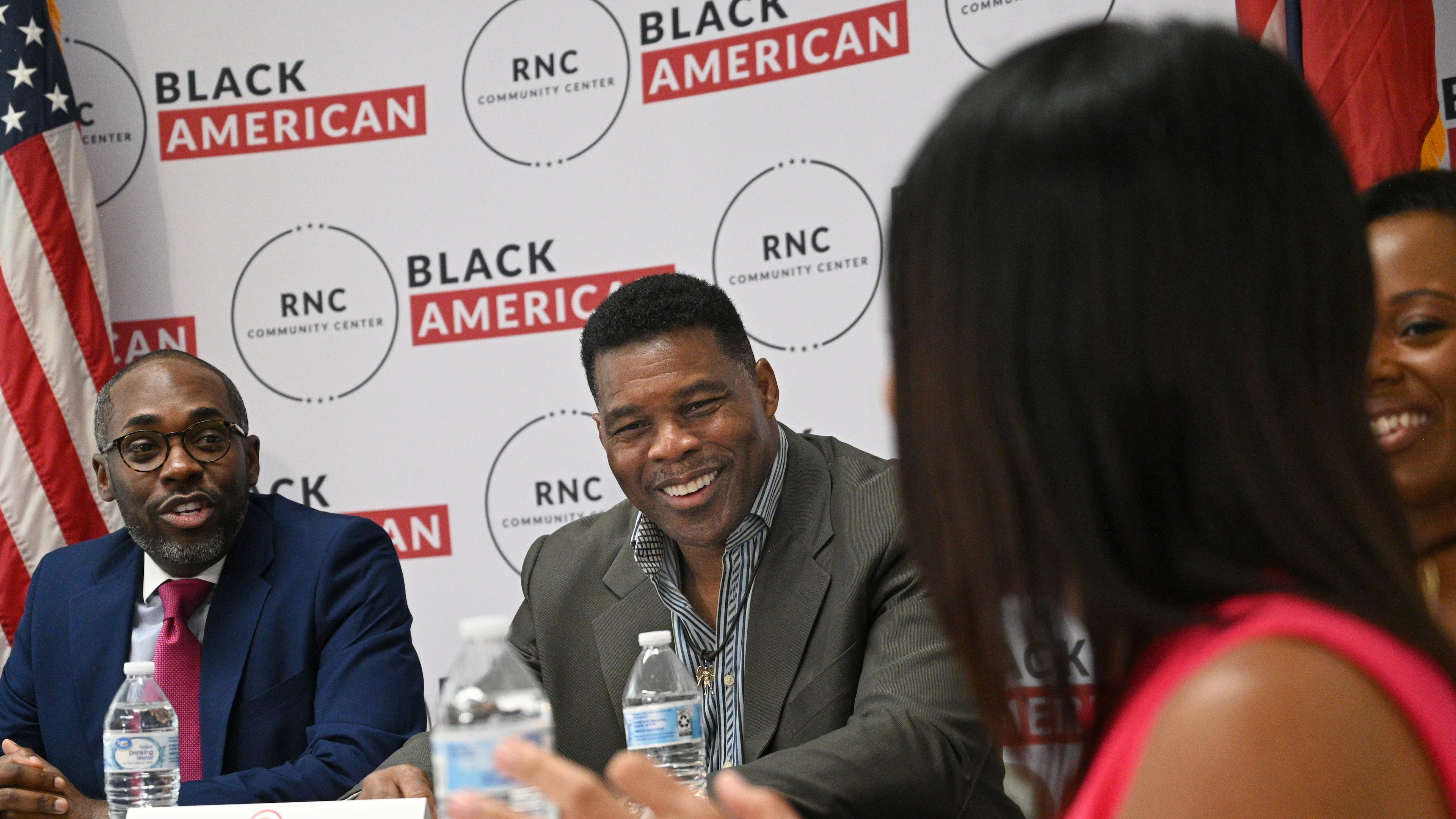 U.S. Senate candidate Herschel Walker reacts as he speaks during a Republican National Committee roundtable in College Park with Black business owners. Walker has been critical of state and federal programs that support minority-owned firms, although his own company, Renaissance Man Food Services, has benefited from them. (Hyosub Shin / Hyosub.Shin@ajc.com)