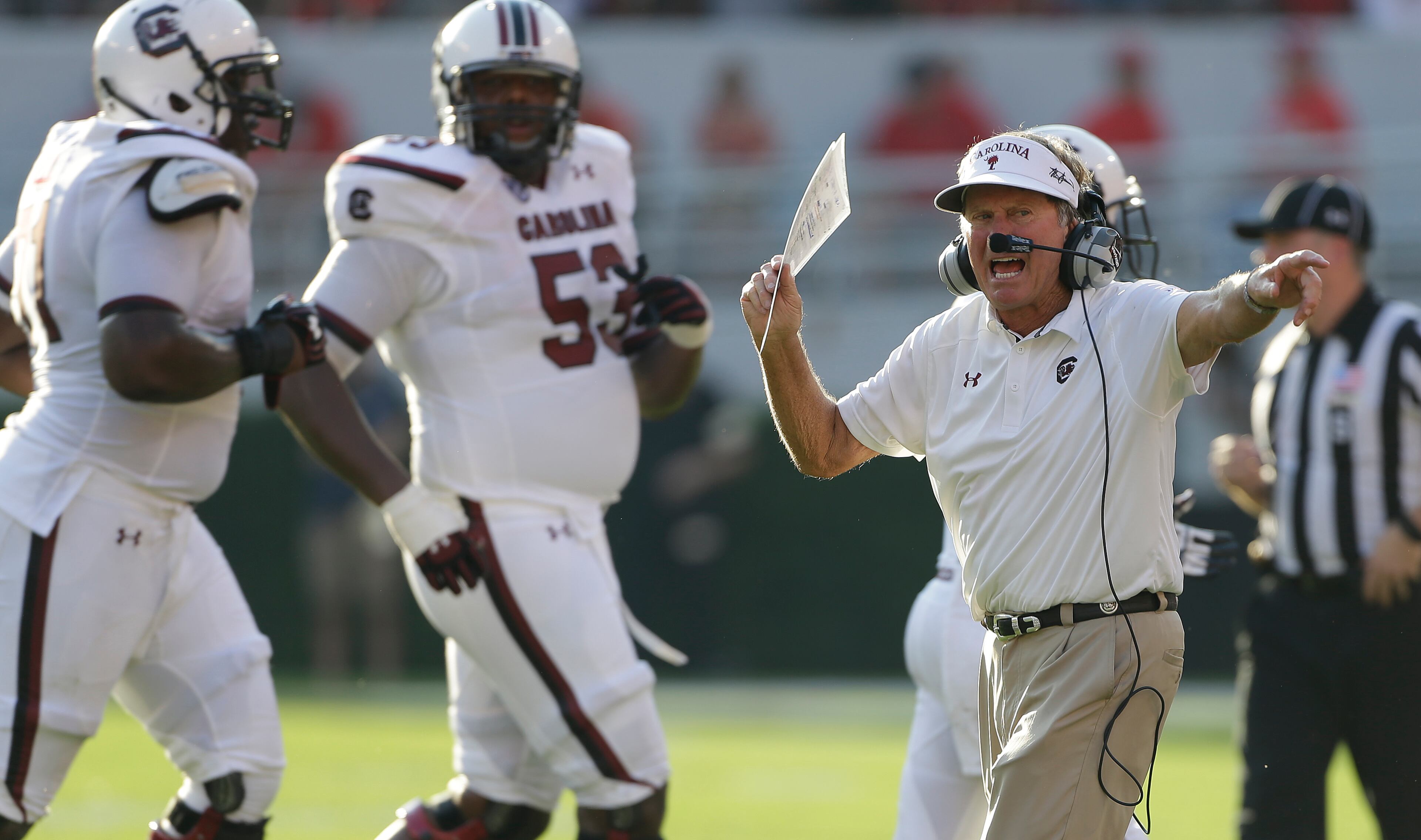 South Carolina head coach Steve Spurrier speaks to an official during the second half of an NCAA football game against Georgia, Saturday, Sept. 7, 2013, in Athens, Ga. (AP Photo/John Bazemore)