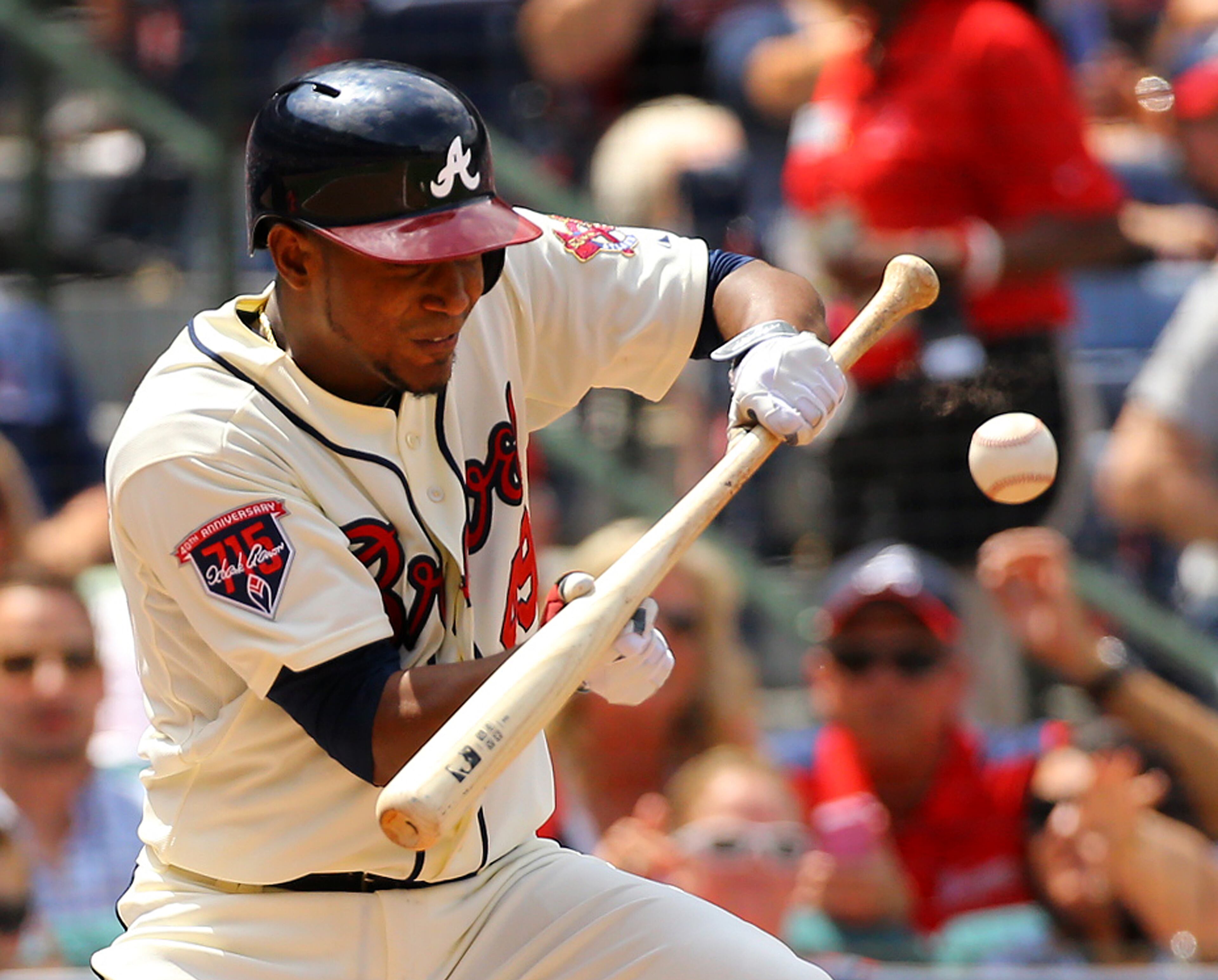 Julio Teheran lays down a sacrifice bunt to advance the runners during the fifth inning. CURTIS COMPTON / CCOMPTON@AJC.COM