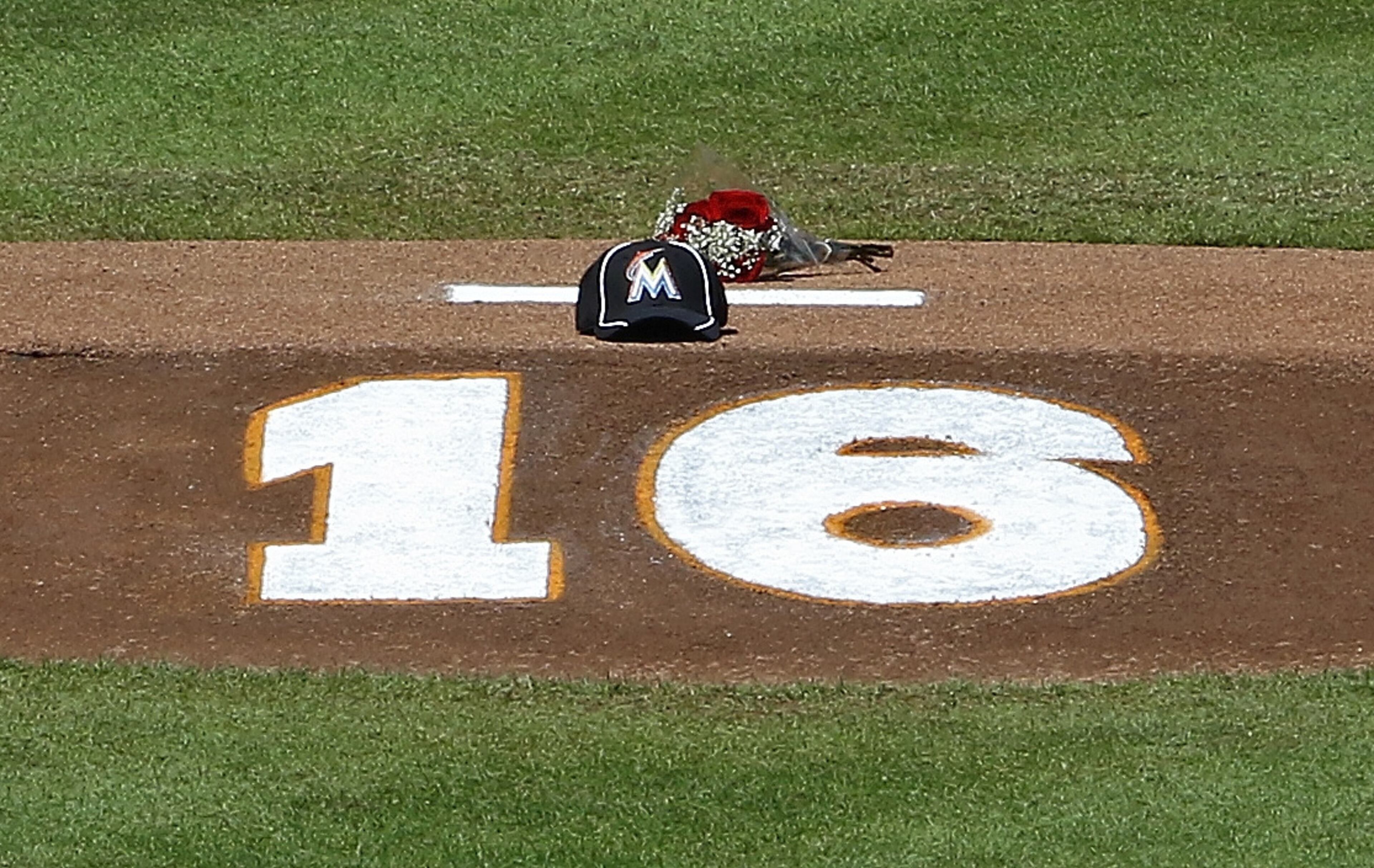 Flowers, a hat and the number of Miami Marlins pitcher Jose Fernandez is shown on the pitching mound at Marlins Park on September 25, 2016 in Miami, Florida. Fernandez died in a boating accident. (Photo by Joe Skipper/Getty Images)