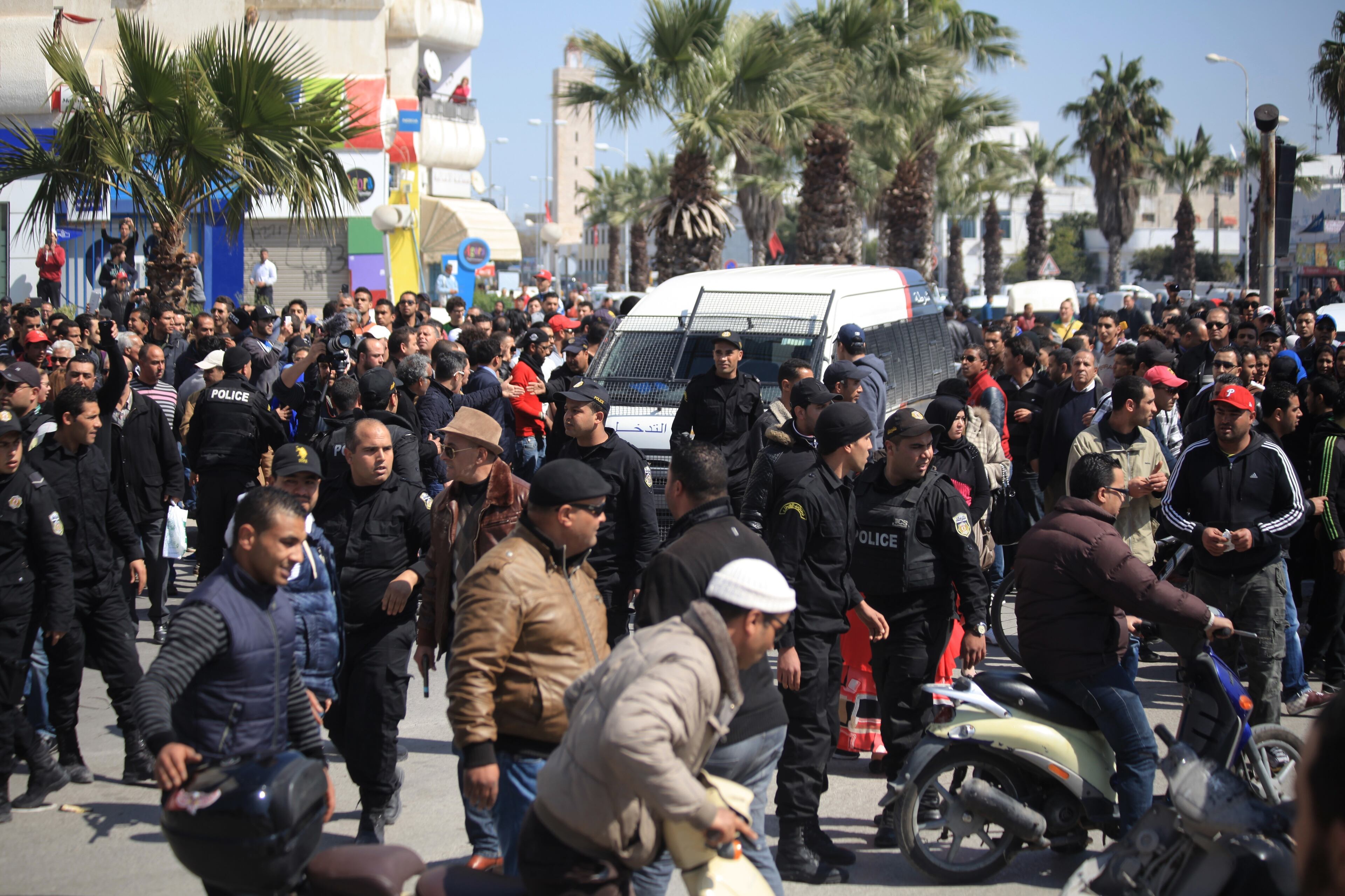 TUNIS, TUNISIA - MARCH 18: Police forces arrest a suspicious man when gunmen take an unknown number of tourists hostage at the National Bardo Museum, near the country's parliament in Tunis, on Wednesday, March 18, 2015. (Photo by Yassine Gaidi /Anadolu Agency/Getty Images)