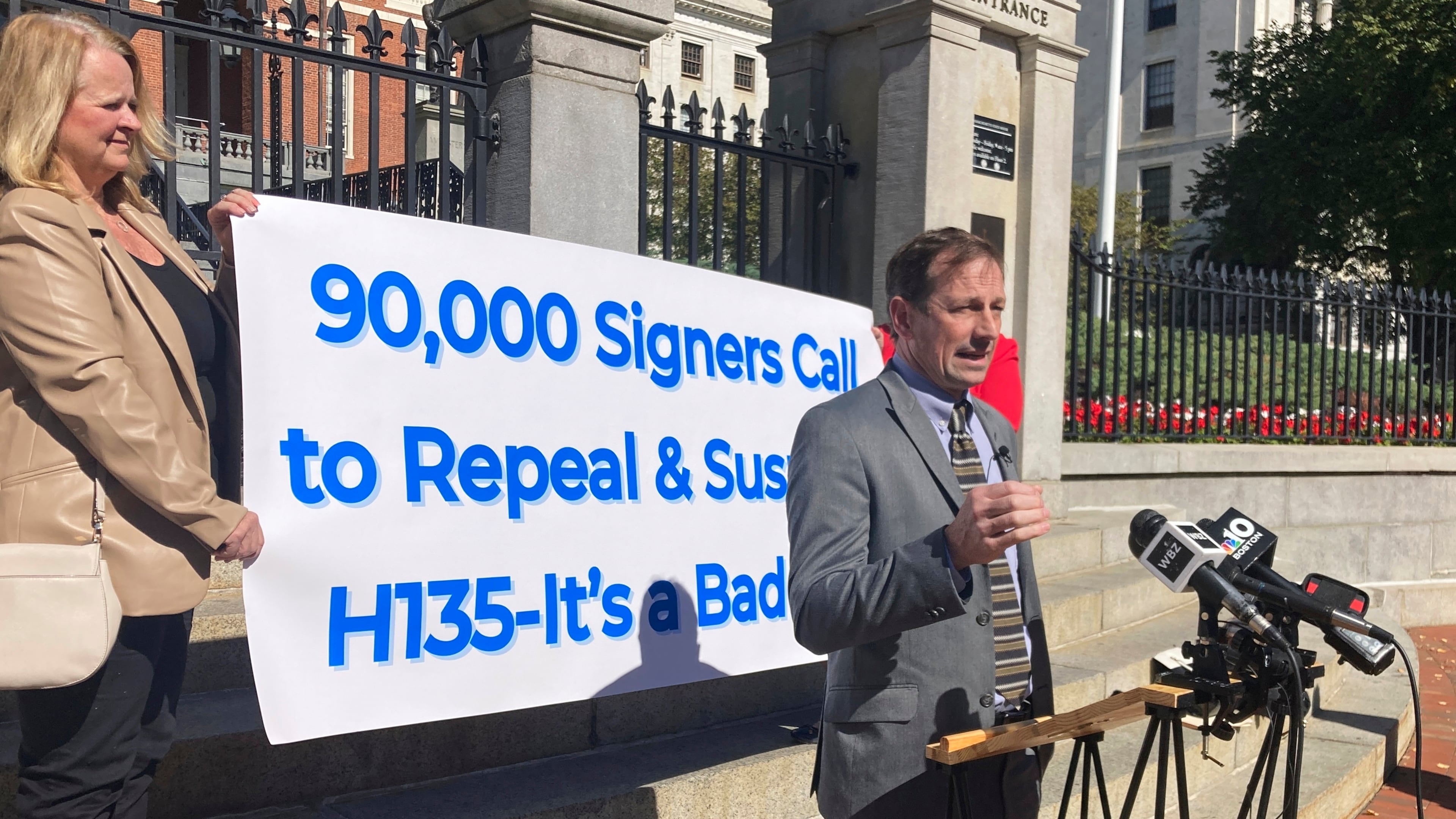 FILE - Toby Leary, a gun shop owner and Second Amendment advocate, announces that firearms activists have collected enough signatures to place a question on the Massachusetts 2026 ballot that would repeal the state's new sweeping gun law, Oct. 8, 2024, outside the Massachusetts Statehouse in Boston. (AP Photo/Steve LeBlanc, File)