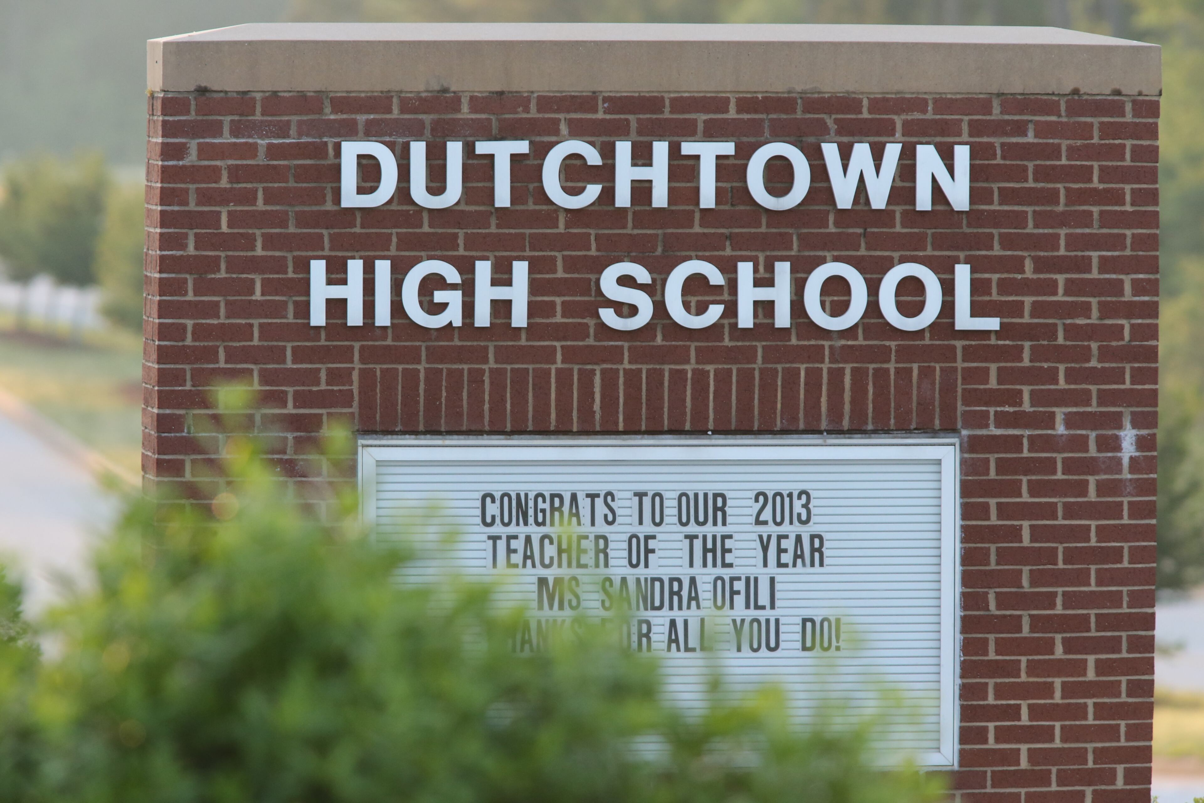 The scene at Dutchtown High School Thursday morning as students gathered before class after losing classmate in a Wednesday afternoon accident.