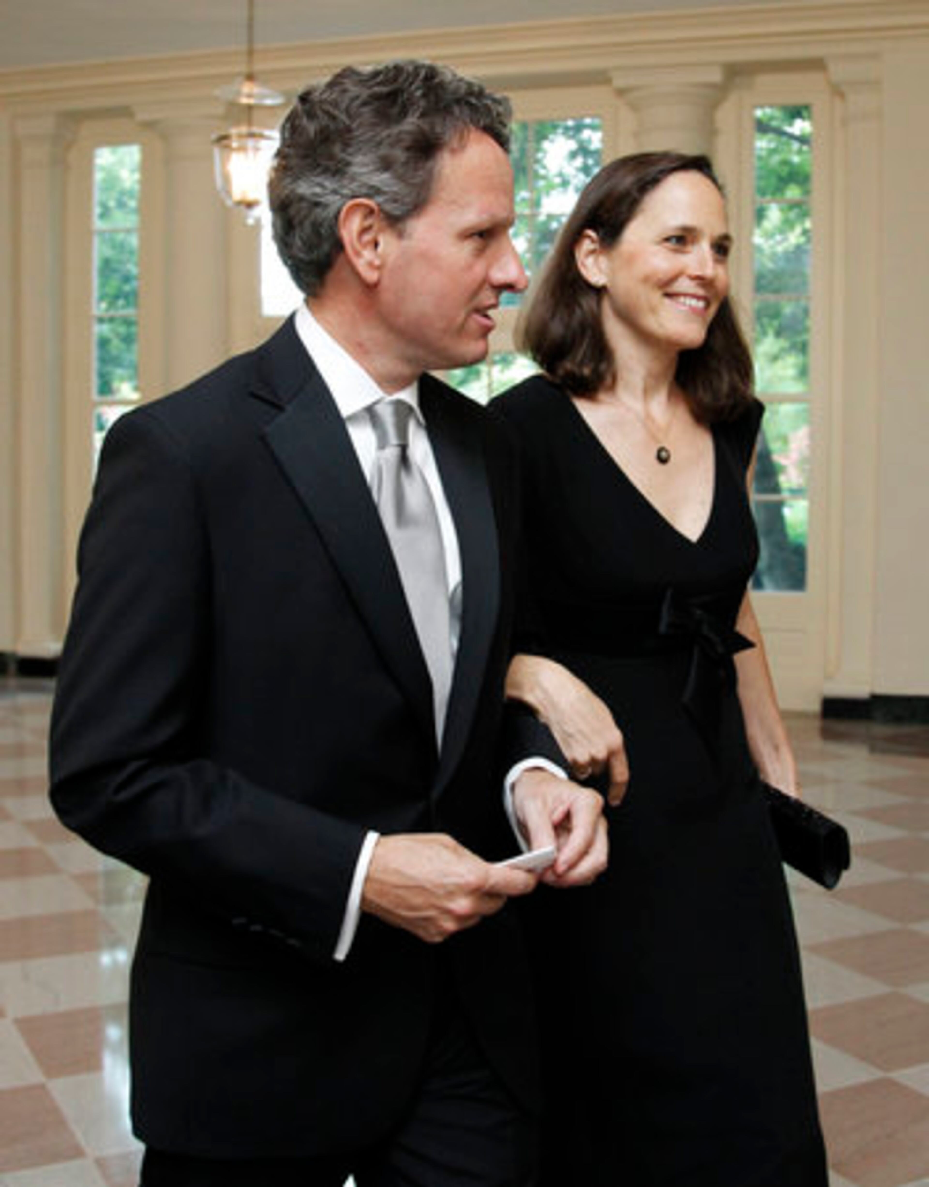 Treasury Secretary Timothy Geithner and his wife Carole Geithner arrive.