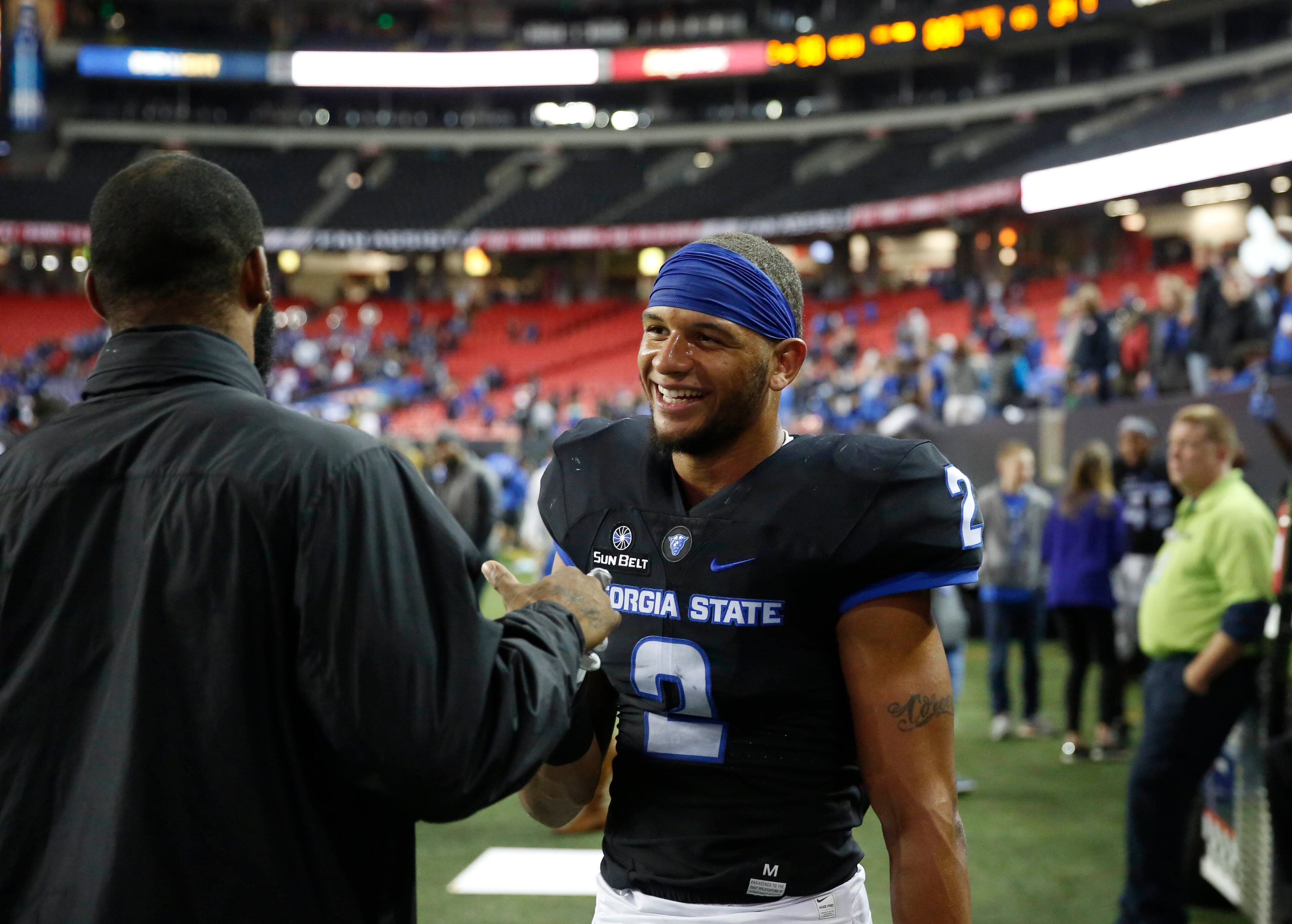 November 19, 2016 - Atlanta, Ga: Georgia State Panthers quarterback Jaquez Parks (2) celebrate after their win against the Georgia Southern Eagles at the Georgia Dome Saturday November 19, 2016, in Atlanta, Ga. Georgia State won 30-24. PHOTO / JASON GETZ