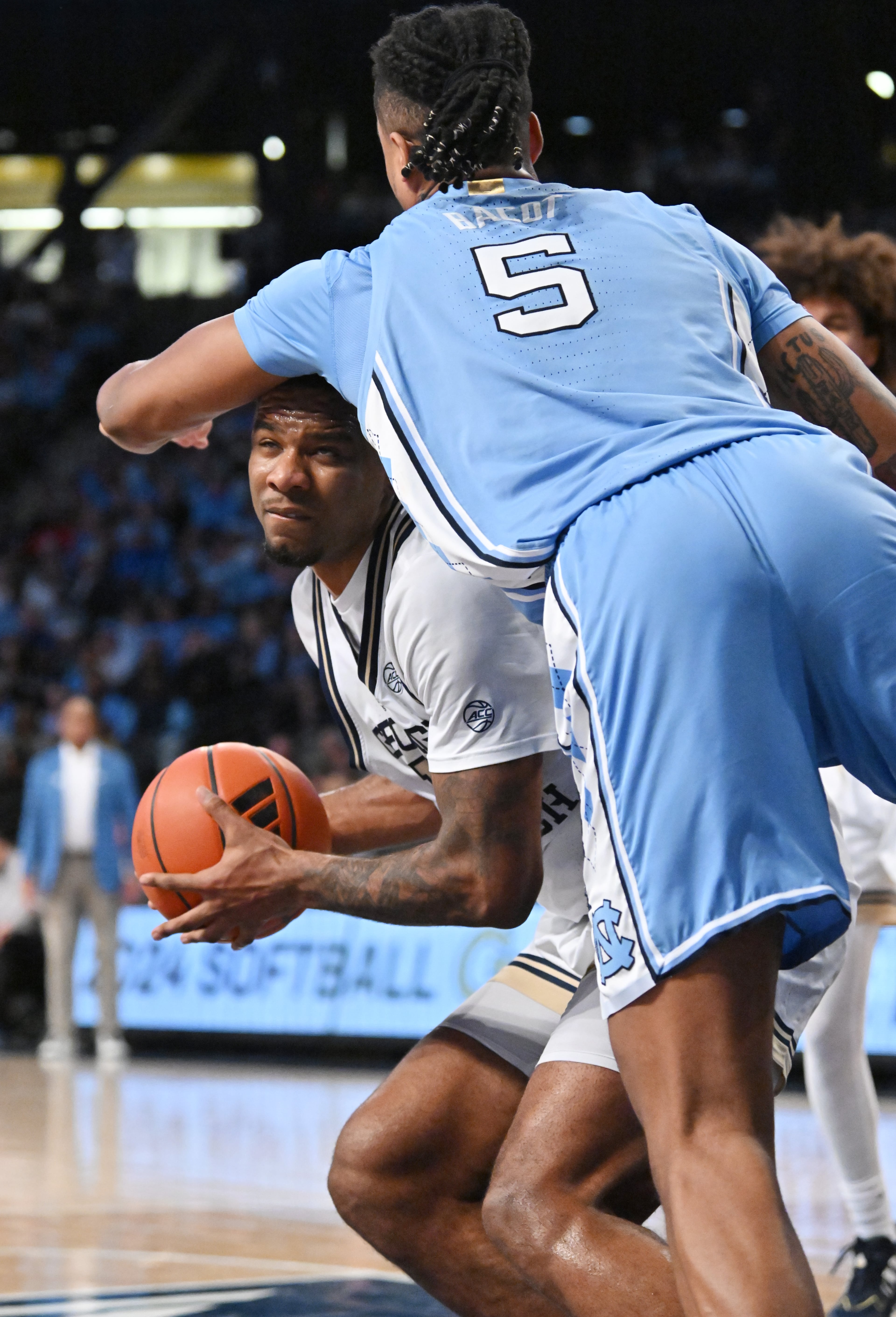 Georgia Tech forward Tyzhaun Claude (left) prepares to shoot against North Carolina forward Armando Bacot (5) during the second half of an NCAA college basketball game at Georgia Tech’s McCamish Pavilion, Tuesday, January 30, 2024, in Atlanta. Georgia Tech won 74-73 over North Carolina. (Hyosub Shin / Hyosub.Shin@ajc.com)