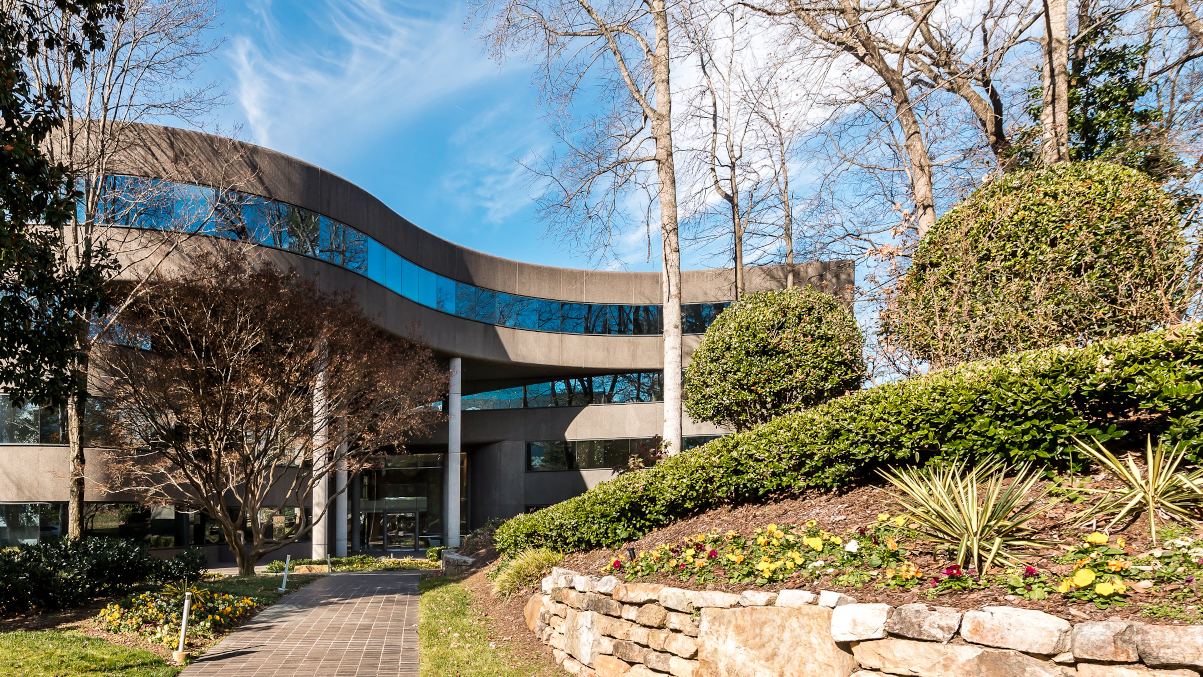 This is a photo of Piedmont Place, an office building at 3520 Piedmont Road NE, which was acquired by Christ Covenant Church in 2026. Transwestern represented the church in the sale. (Courtesy of Transwestern)