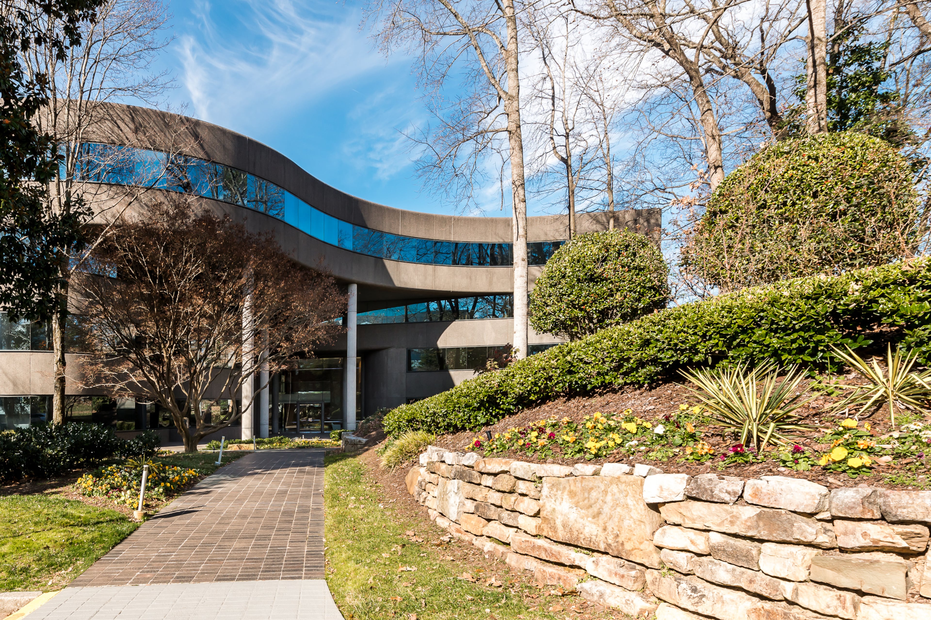This is a photo of Piedmont Place, an office building at 3520 Piedmont Road NE, which was acquired by Christ Covenant Church in 2026. Transwestern represented the church in the sale. (Courtesy of Transwestern)