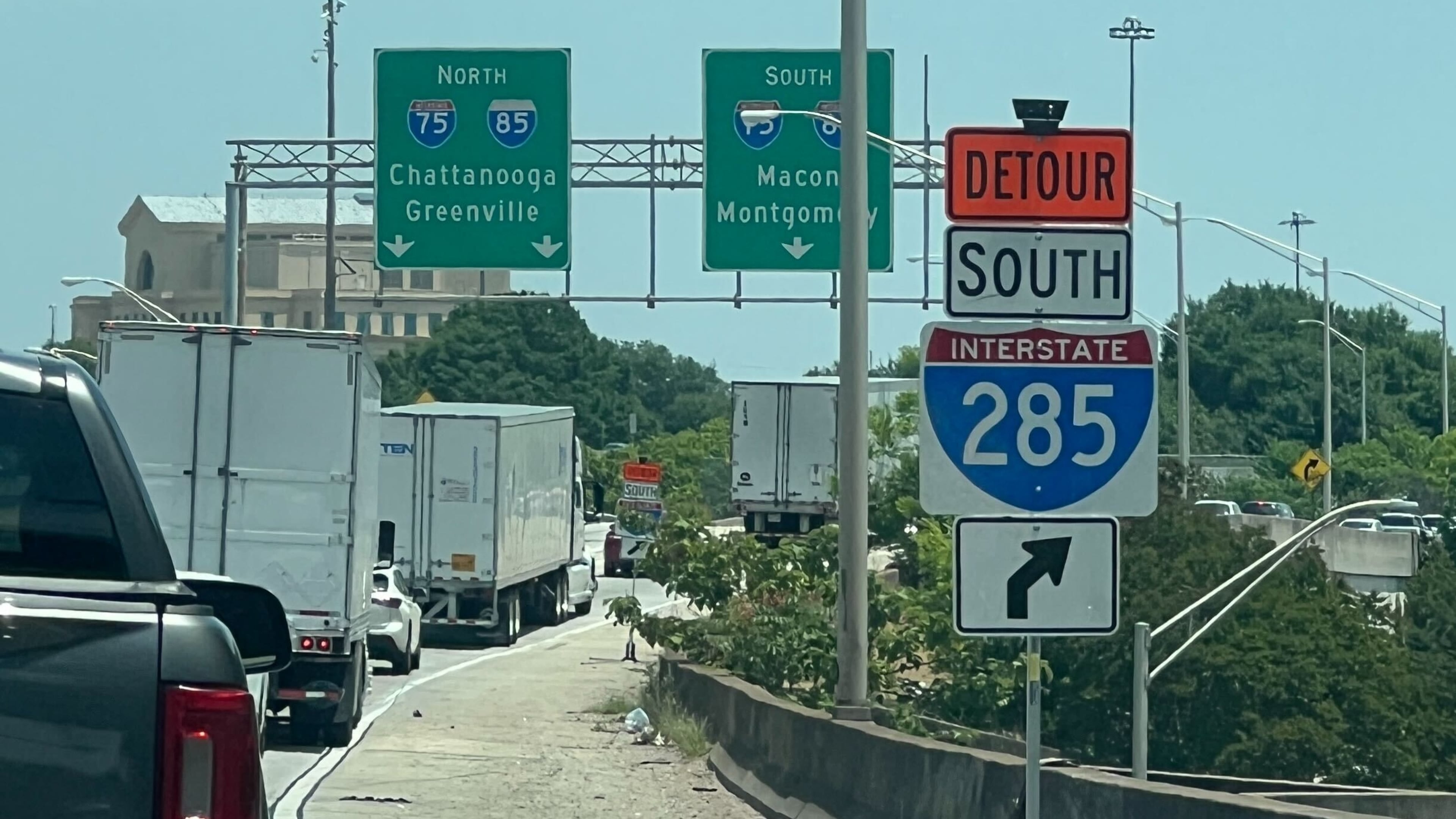 A detour sign directs I-20 eastbound traffic as motorists maneuver around an I-285 closure on Saturday, May 16, 2026. The GDOT is rebuilding the I-285 and I-20 interchanges on the east and west sides of Atlanta. (Cassidy Alexander/AJC)