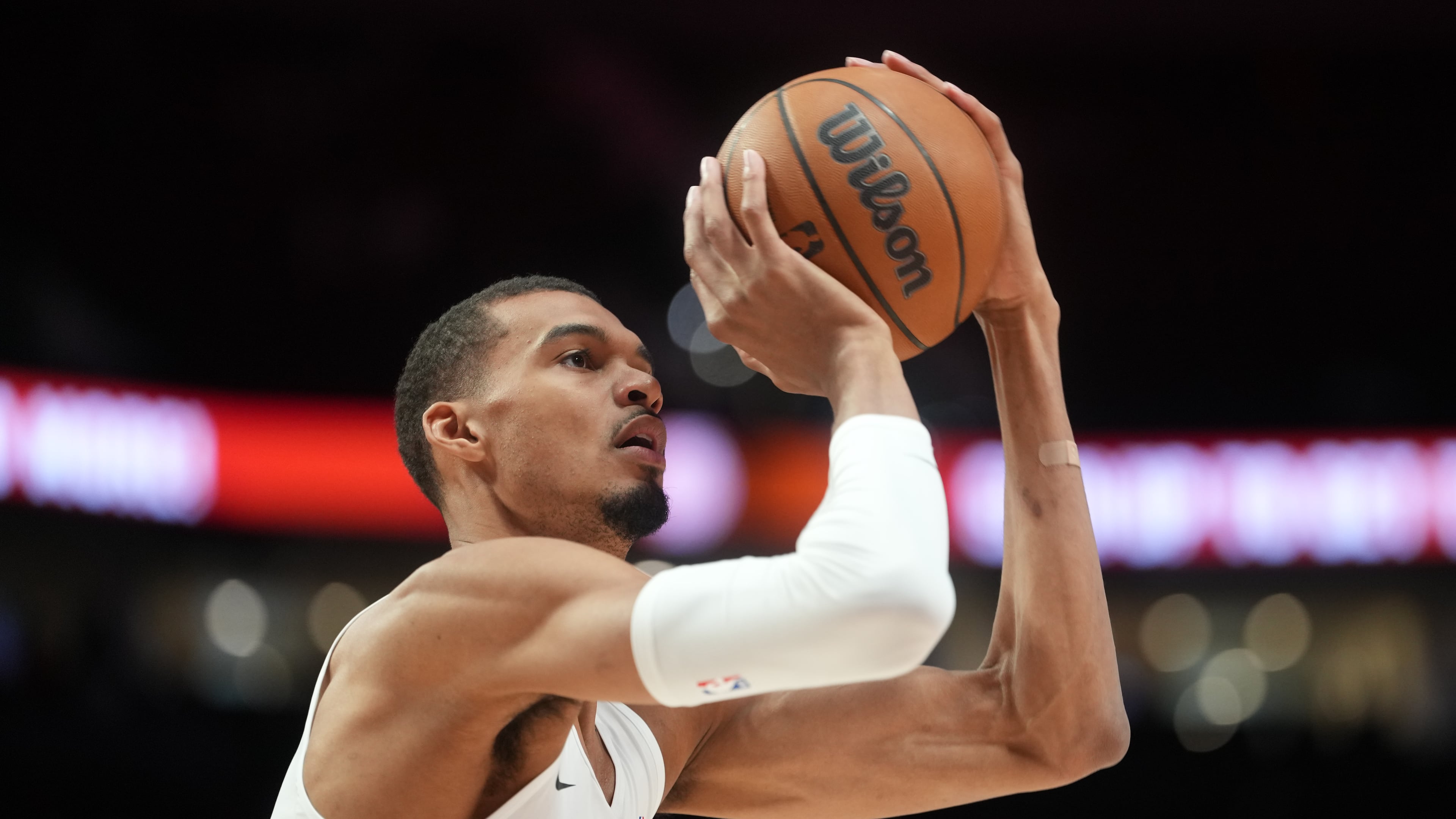 San Antonio Spurs forward/center Victor Wembanyama warms up before Game 4 of a first-round NBA basketball playoffs series against the Portland Trail Blazers in Portland, Ore, Sunday, April 26, 2026. (AP Photo/Jenny Kane)