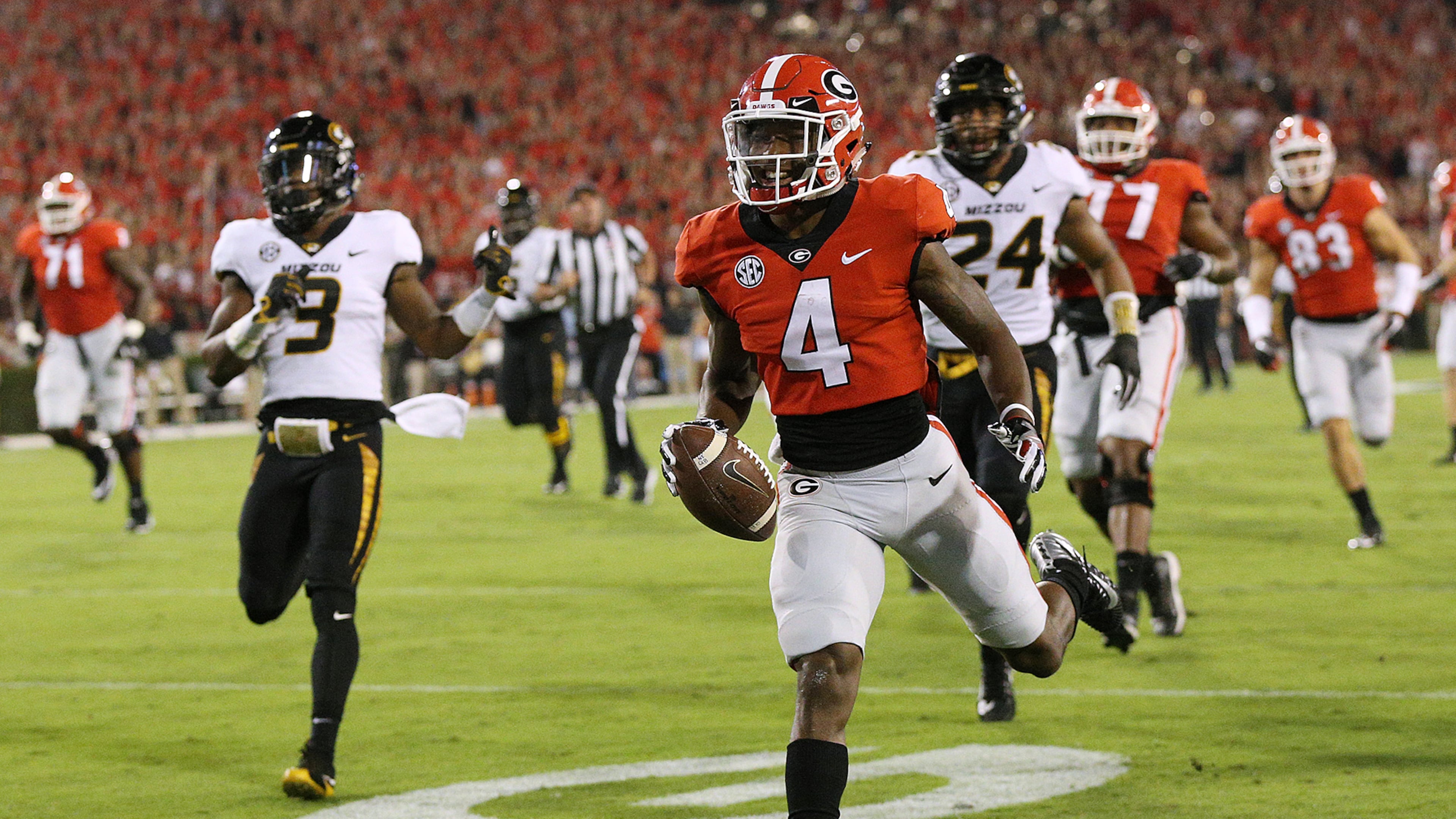 Georgia wide receiver Mecole Hardman runs for a touchdown against Missouri during the first quarter of an NCAA college football game Saturday, Oct. 14, 2017, in Athens, Ga. (Curtis Compton/Atlanta Journal Constitution via AP)