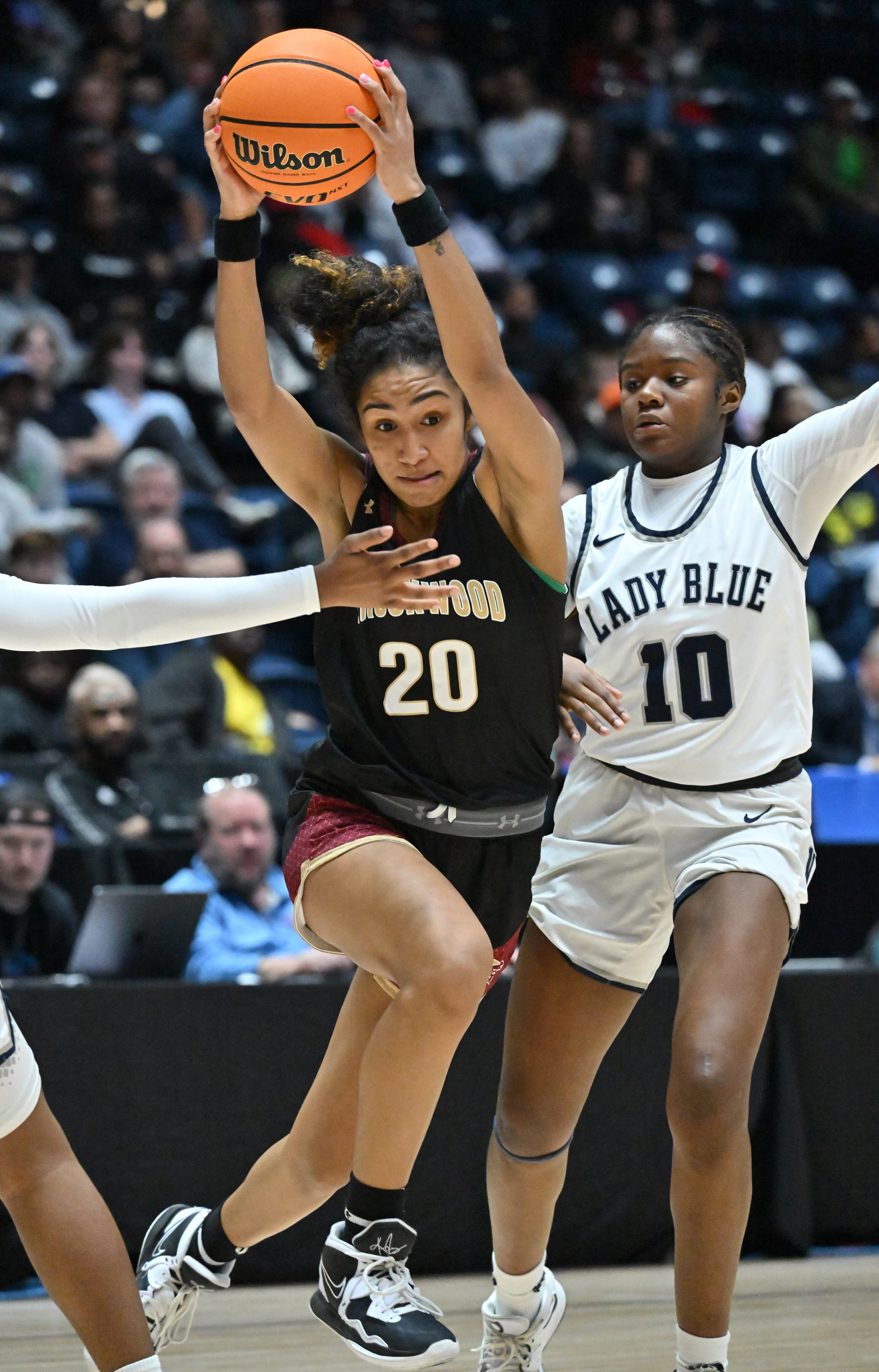 Brookwood's Diana Collins (20) drives a ball during 2023 GHSA Basketball Class 7A Girl’s State Championship game at the Macon Centreplex, Saturday, March 11, 2023, in Macon, GA. (Hyosub Shin / Hyosub.Shin@ajc.com)